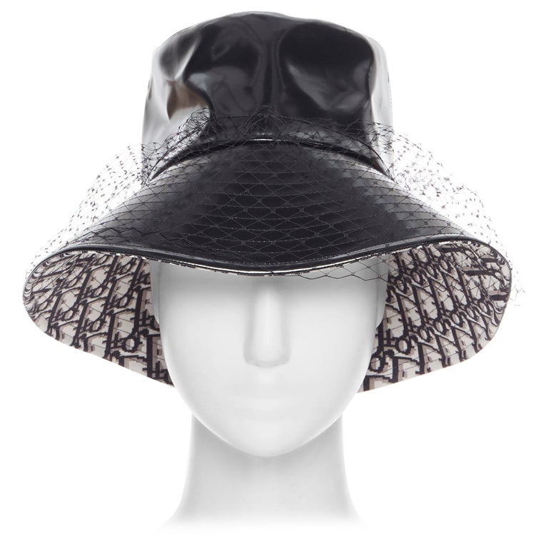 Bucket Hat with black LV Inspired Monogram print made from Faux