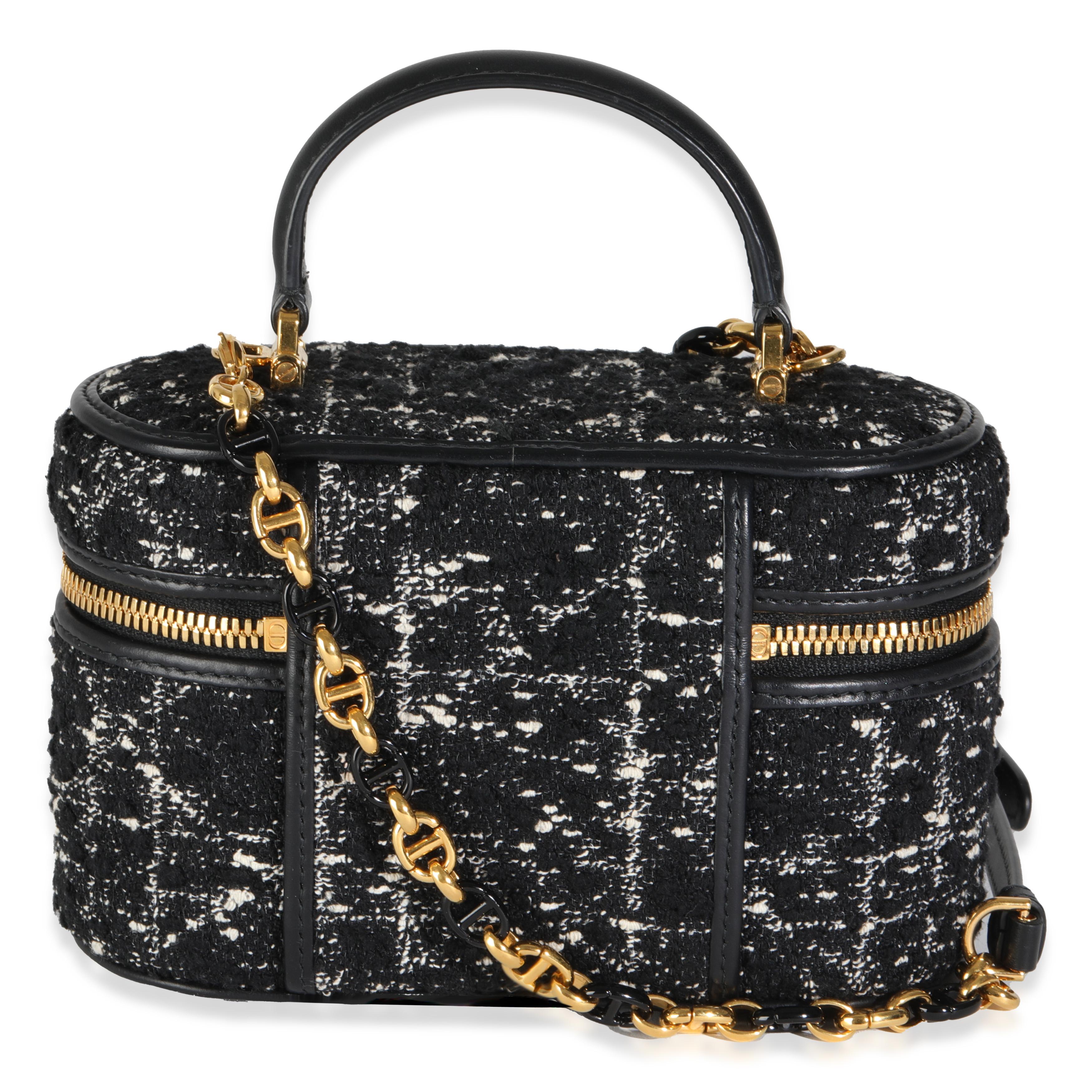 Listing Title: Christian Dior Black Gold Tweed Mini Caro Vanity
SKU: 144962
MSRP: 2800.00 USD
Condition: Pre-owned 
Handbag Condition: Excellent
Condition Comments: Item is in excellent condition and displays light signs of wear. Pressmarks along