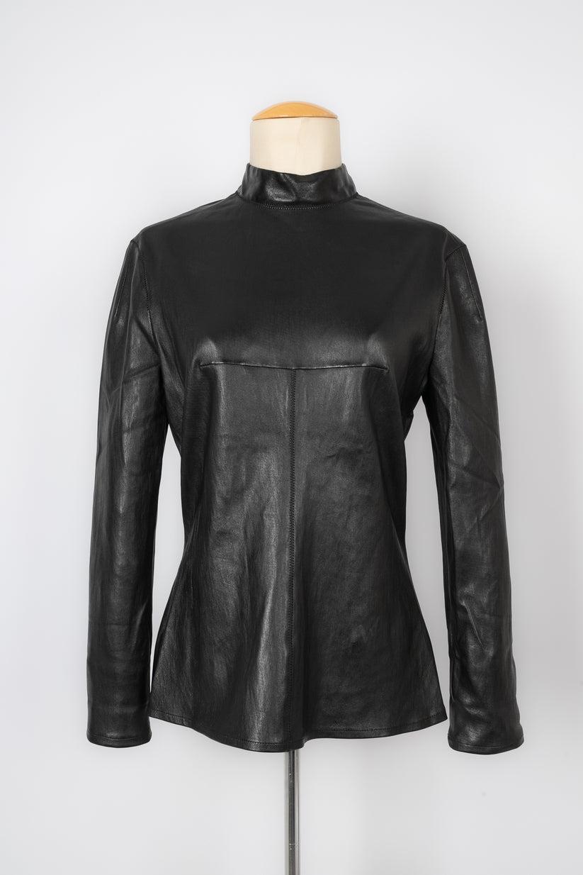 Dior - (Made in France) Black lamb leather top with long sleeves. 42FR size indicated.

Additional information:
Condition: Very good condition
Dimensions: Shoulder width: 41 cm - Chest: 42 cm - Sleeve length: 59 cm - Length: 61 cm

Seller Reference: