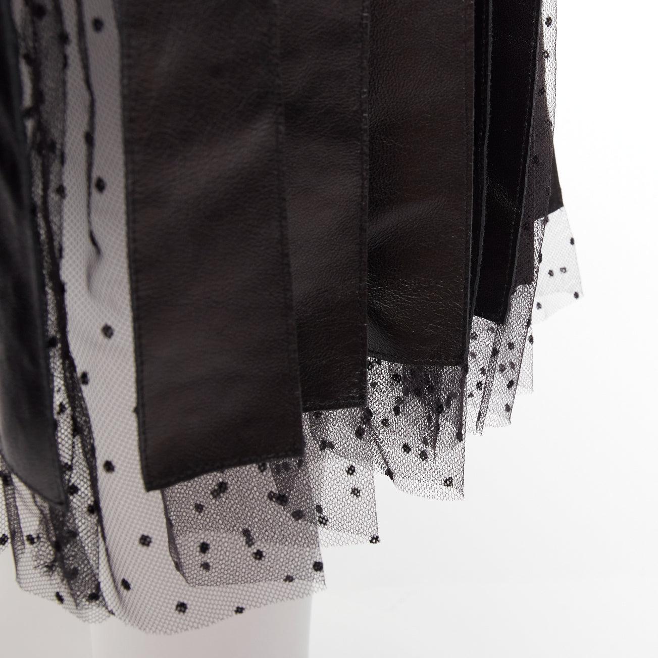 CHRISTIAN DIOR black lambskin leather polka dot lace tulle pleated skirt FR36 S
Reference: AAWC/A00847
Brand: Dior
Designer: Maria Grazia Chiuri
Material: Leather, Tulle
Color: Black
Pattern: Polka Dot
Closure: Snap Buttons
Lining: Black Silk
Extra