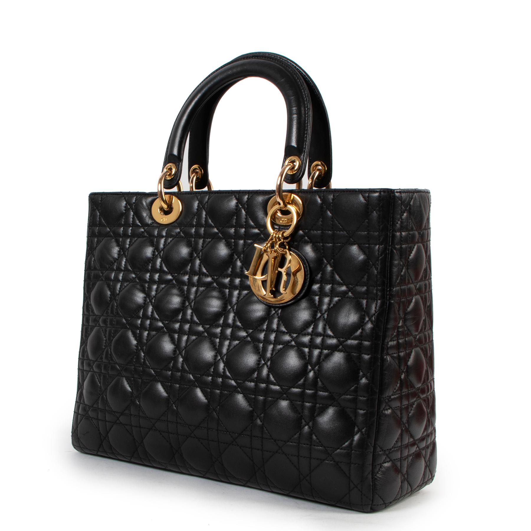 Christian Dior Black Large Lady Dior Cannage Lambskin Bag

Always dreamed of owning a Christian Dior Black Lady Dior Bag? It's your chance! The iconic bag matches every fashionista's outfit and is a true luxurious item. It is carried in the hand or