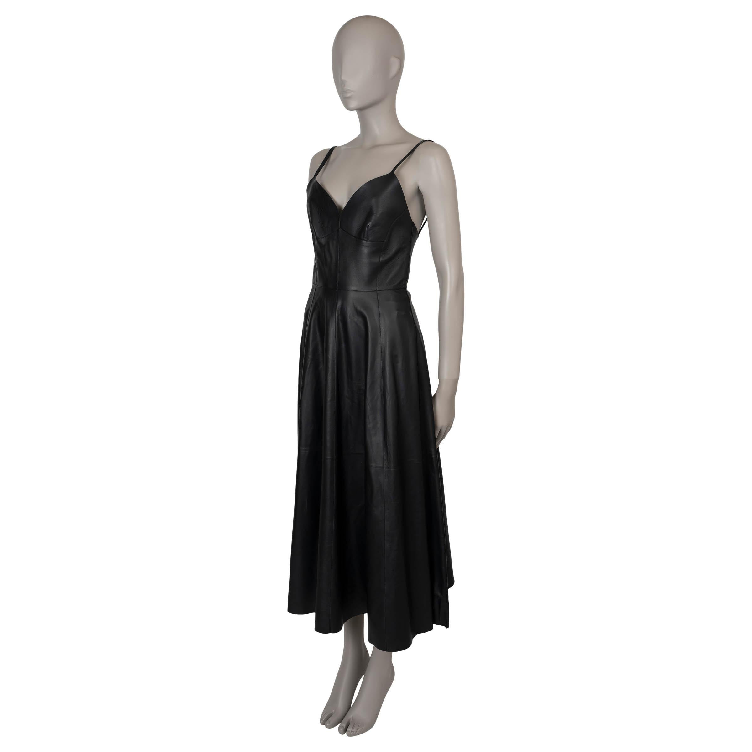 This 100% authentic Christian Dior dress in black lambskin leather combines edgy elegance with a timeless fit-and-flare silhouette. Designed with a flattering midi length and delicate spaghetti straps, it brings a sophisticated touch to any