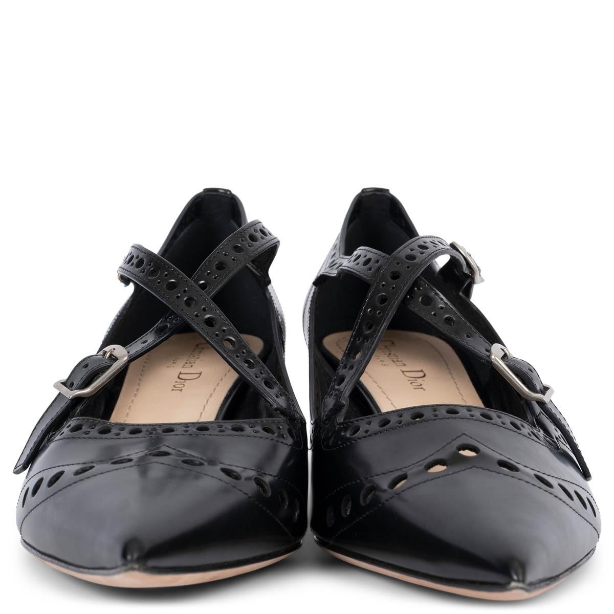 100% authentic Christian Dior 2019 Teddy-D pointed-toe pumps in smooth black leather. The silhouette is upgraded with a perforated brogue-style design throughout and criss cross buckle straps. Brand new. 

Measurements
Imprinted Size	40
Shoe