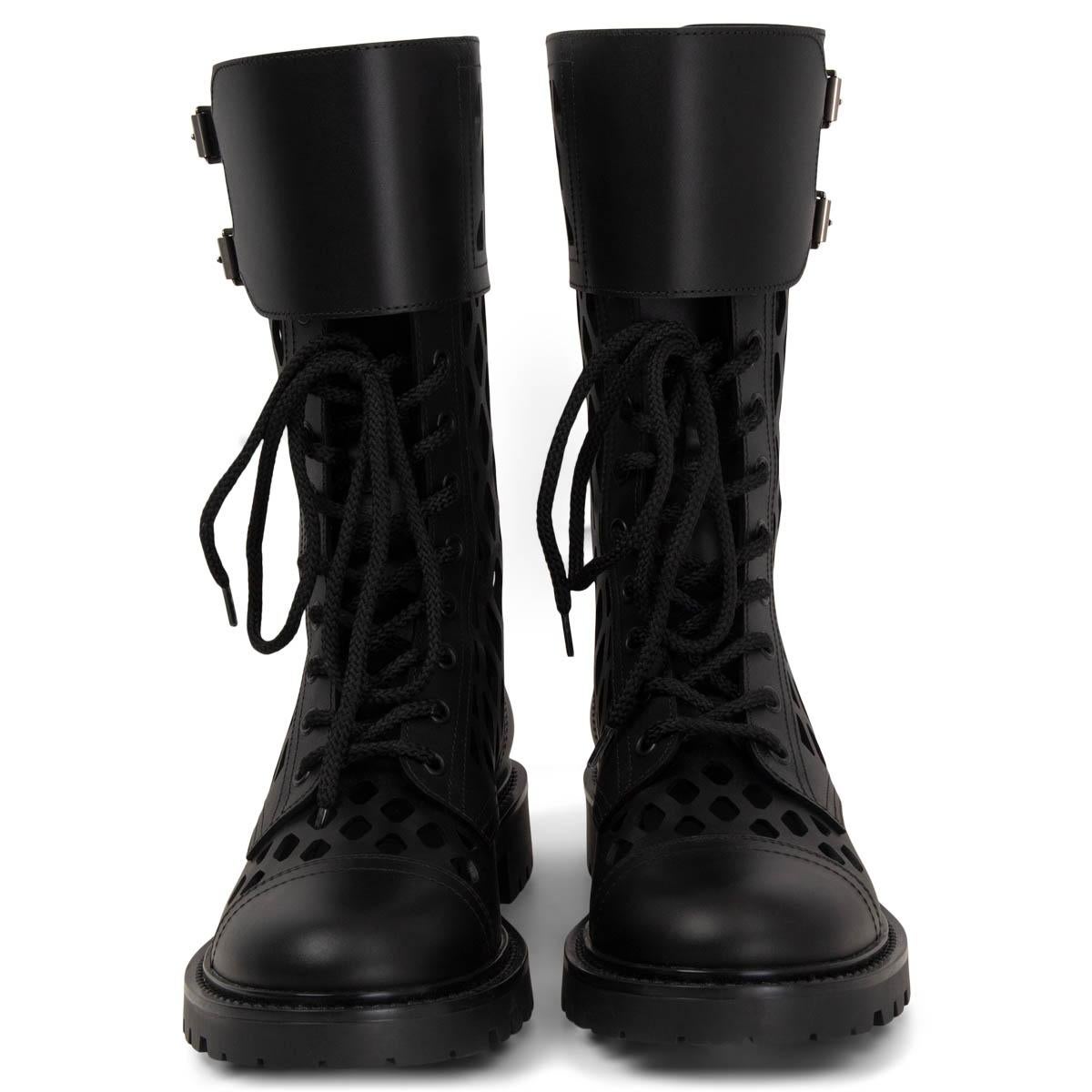 
100% authentic Christian Dior D-Trap Spring 20 lace-up cutout fishnet combat boots in black matte calfskin featuring buckle closure at top and chunky star rubber sole. Brand new. 

Measurements
Imprinted Size	39
Shoe Size	39
Inside Sole	26cm