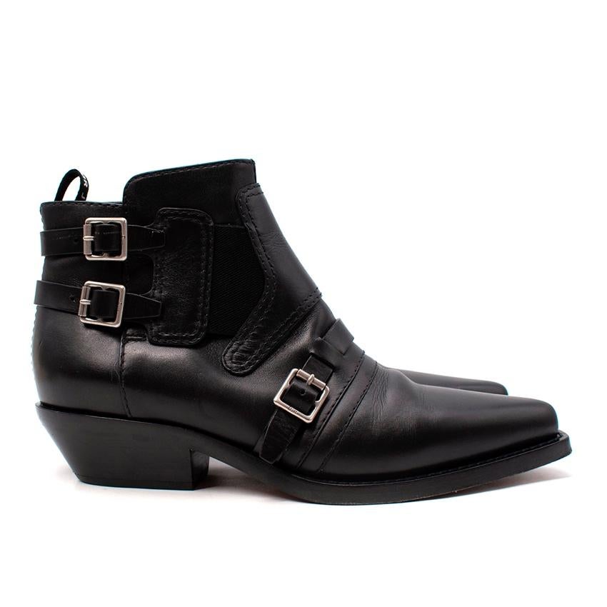 Christian Dior Black Leather Western Buckle Ankle Boots
 

 - Pointed, Western style toe
 - Buckled ankle detail with silver-tone metal hardware
 - Set on a low cuban heel
 - Branded heel tab 
 

 Materials 
 100% Leather 
 100% Metal 
 

 Made in