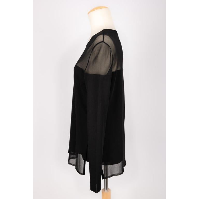 Dior - (Made in Italy) Black mesh long-sleeved top. Size 42FR.

Additional information:
Condition: Very good condition
Dimensions: Shoulder width: 42 cm - Chest: 40 cm - Sleeve length: 61 cm - Length: 72 cm
Seller Reference: FH221