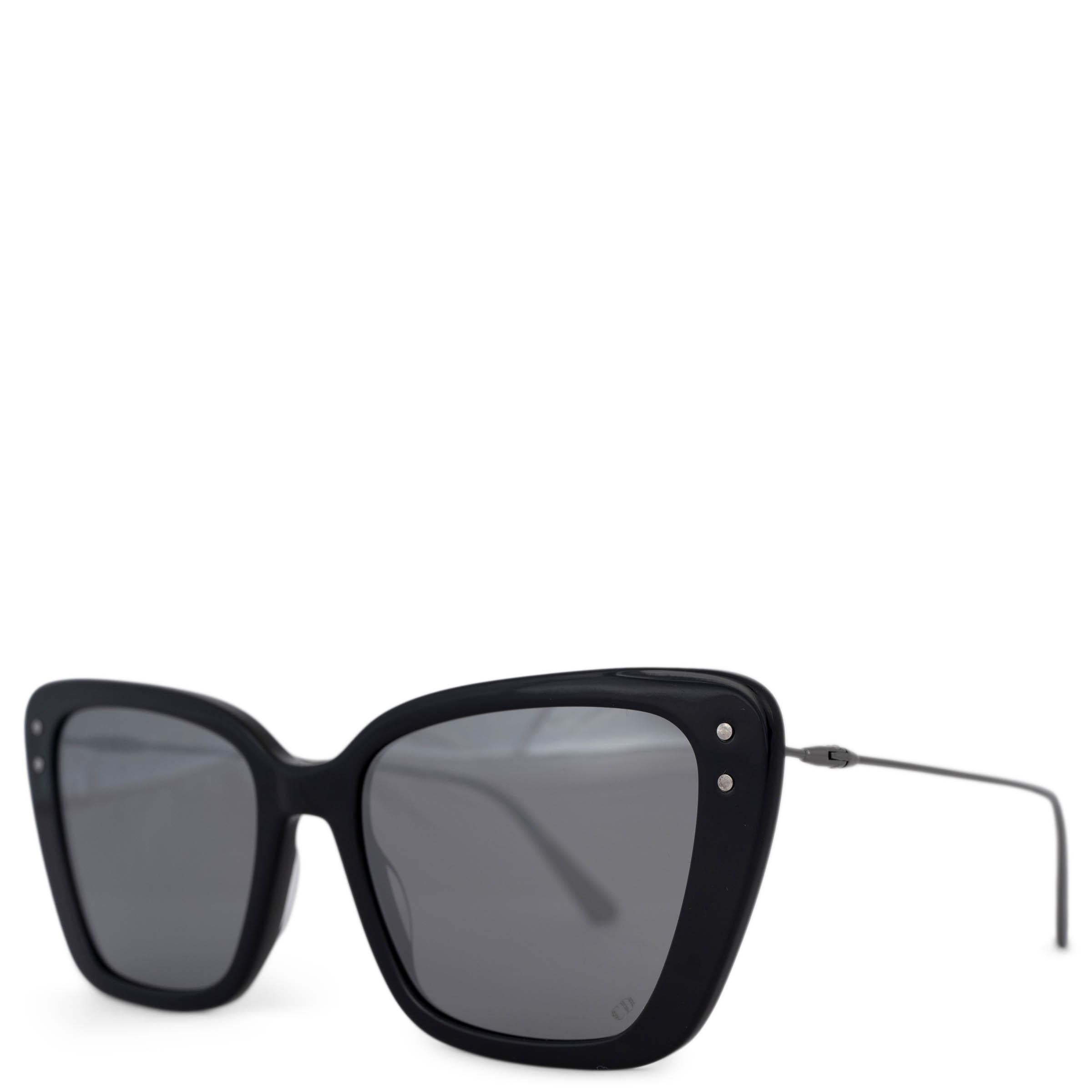 These 100% authentic Christian Dior MissDior butterfly sunglasses are crafted from black acetate and feature striking gray-silver mirrored lenses. Inspired by 1950s glamour, the design includes slender gunmetal arms, adding a vintage touch to the
