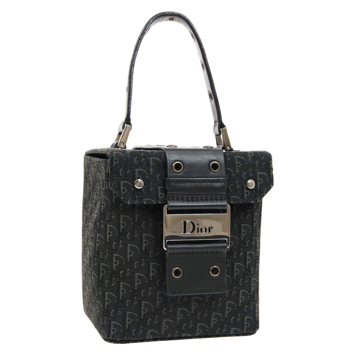 CHRISTIAN DIOR EVENING BAG, with bead black handle, checkered fabric,  magnetic closure at the top, silver tone hardware and bottom feet, 25cm x  20cm H x 7cm with dust bag.