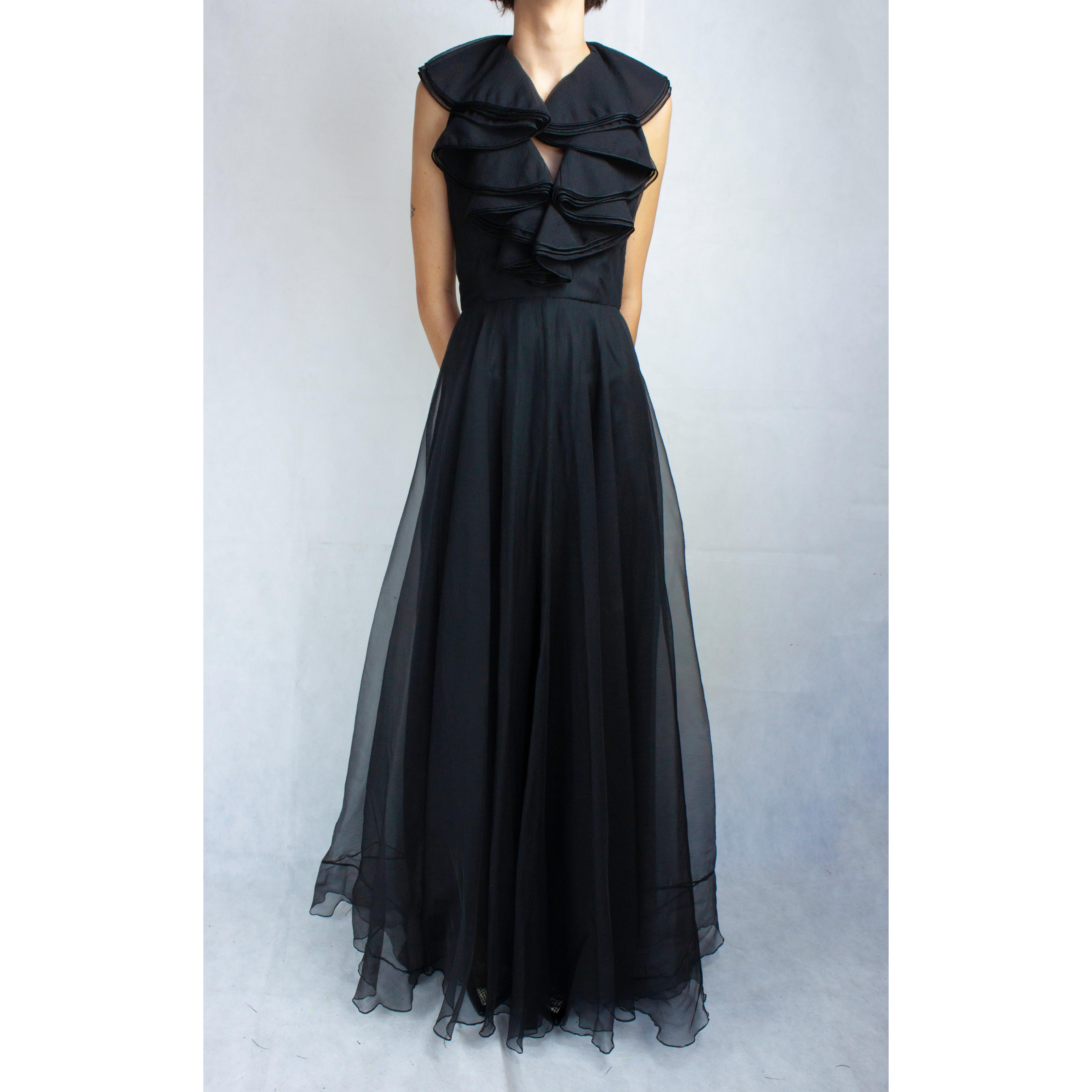 Christian Dior said “The evening is a time when you escape the realities of everyday life”. 
This idea is definitely embodied within this exquisite evening gown from the renowned French couture label.

The dress was designed by one of the house’s