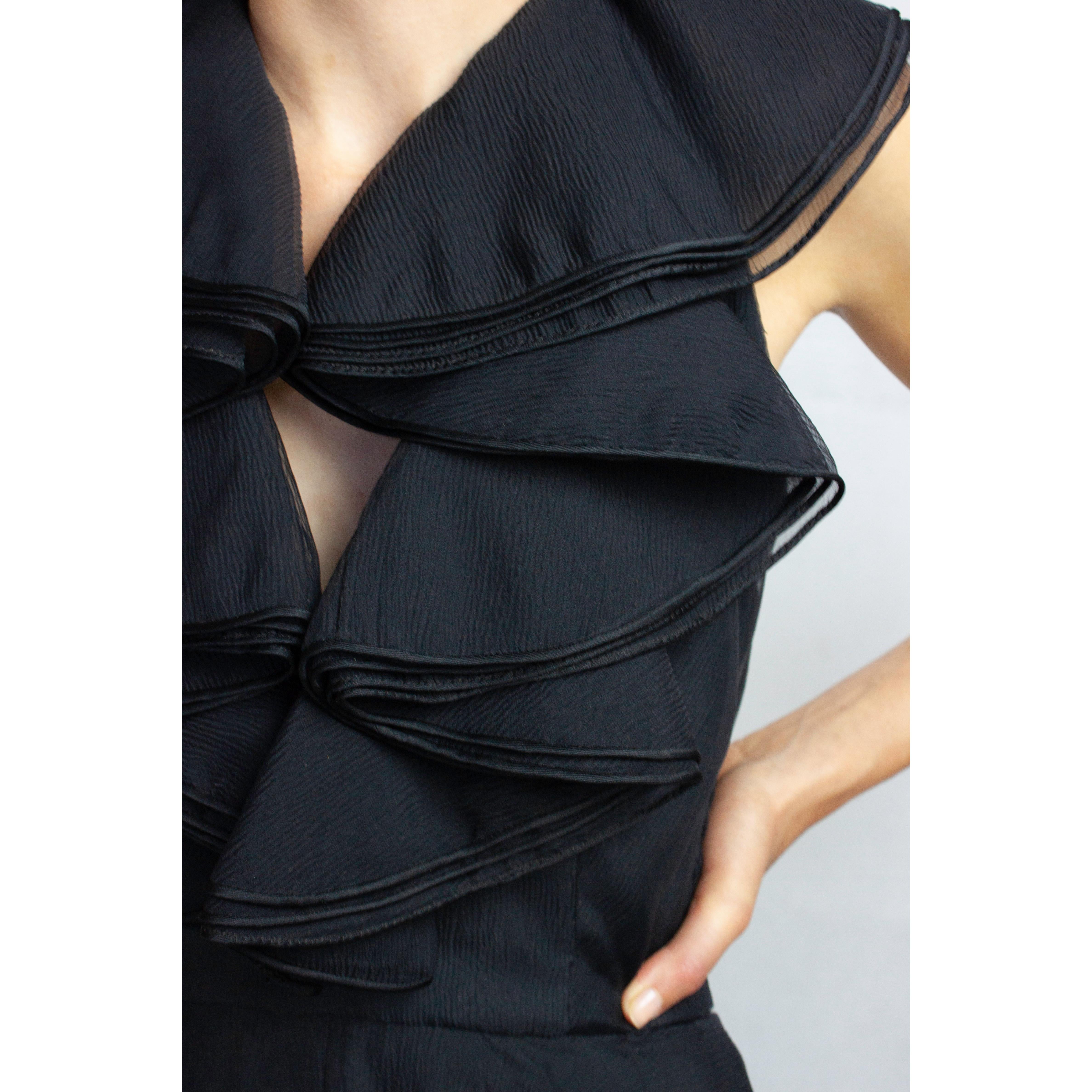 Christian Dior black opened back silk evening dress. circa 1970s  1