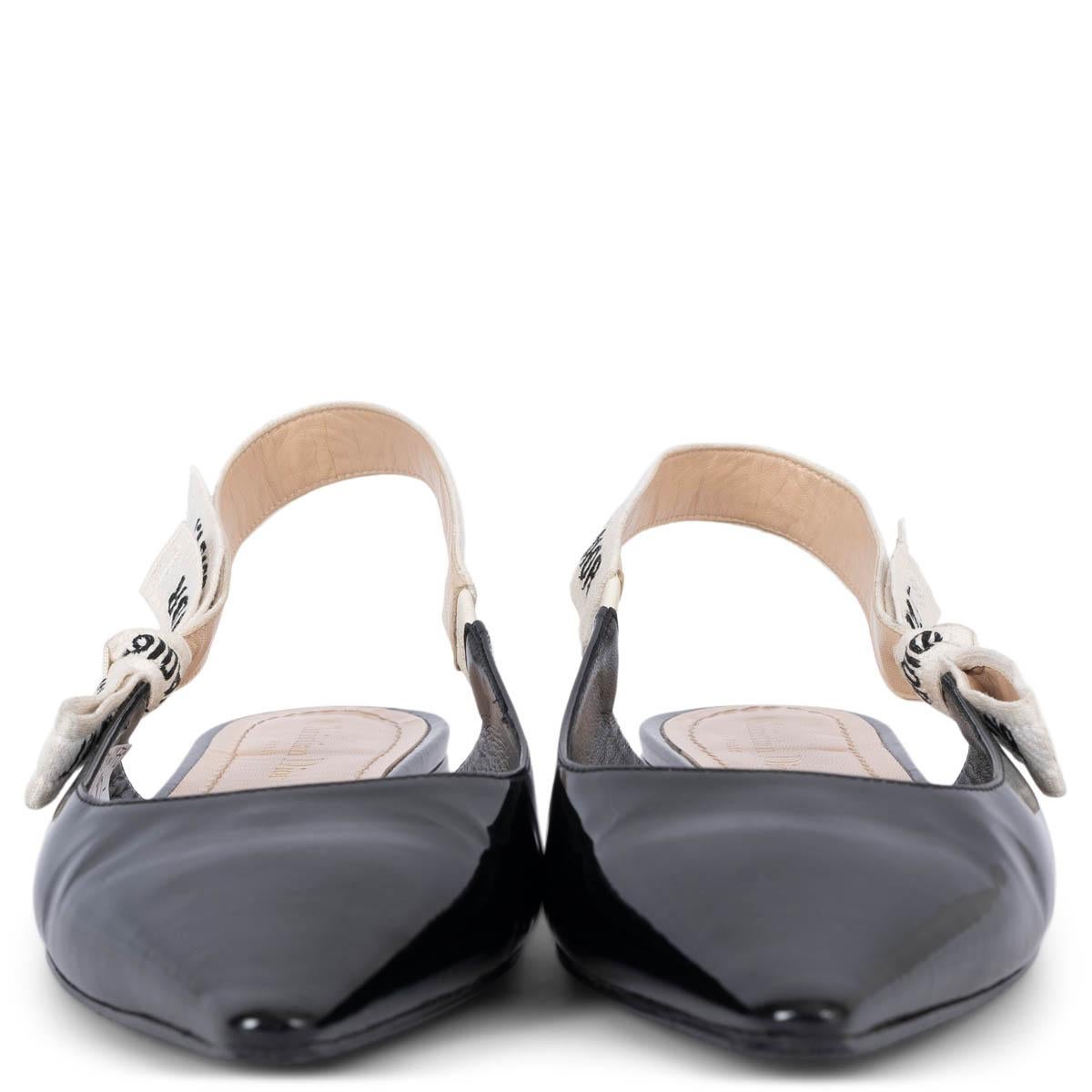 100% authentic Christian Dior J'Adior slingback flats in black patent leather with classic J'Adior canvas ribbon. Have been worn and are in excellent condition. Black rubber sole has been added. 

Measurements
Model	KCB384VNRS900
Imprinted