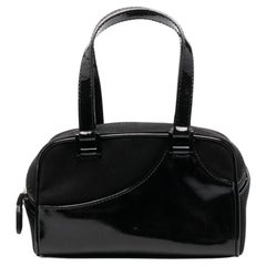 Christian Dior Schwarze Mini-Handtasche aus Lackleder