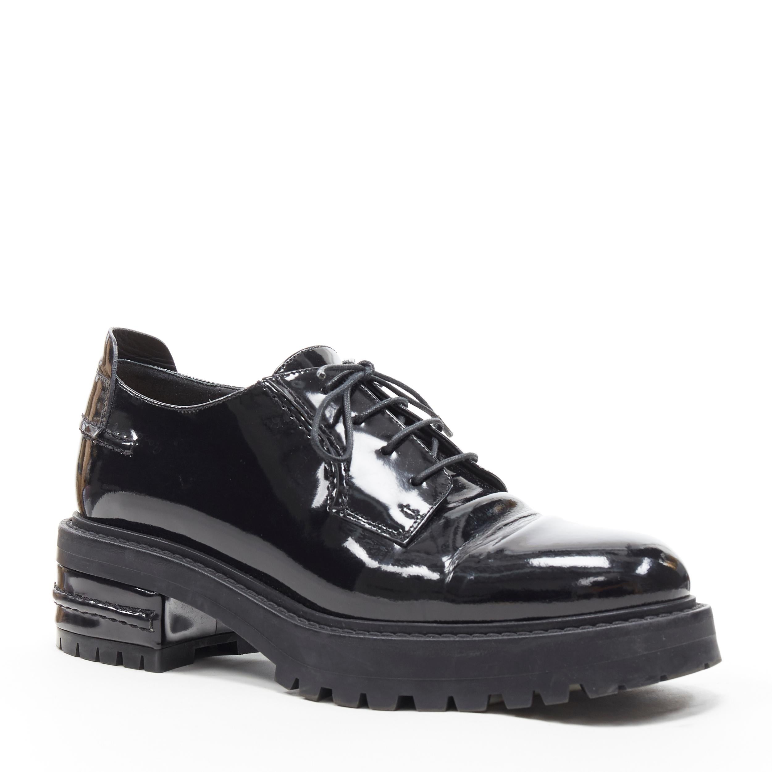 CHRISTIAN DIOR black patent stacked trucker platform sole lace up brogue EU38
Brand: Christian Dior
Designer: Christian Dior
Model Name / Style: Patent brogue
Material: Patent leather
Color: Black
Pattern: Solid
Closure: Lace up
Extra Detail: