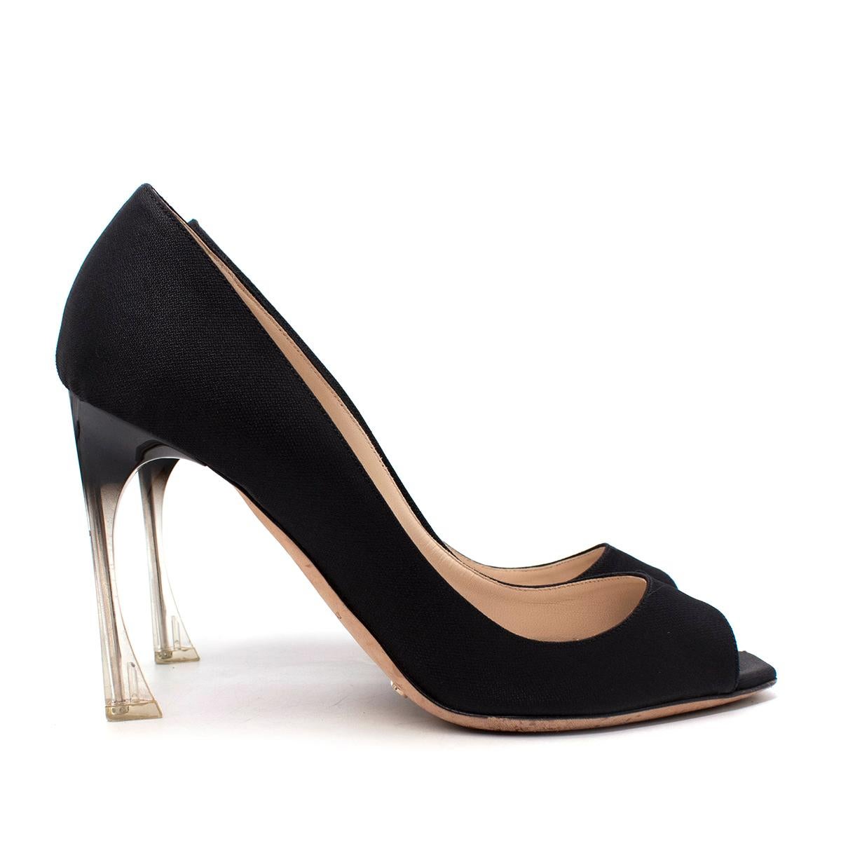 Christian Dior Black Peep Toe Transparent Heel Pumps

- Black jacquard upper 
- Square peep toe
- Black to transparent tone ombre high heel
- Leather insole

Materials:
Leather

Made in Italy

PLEASE NOTE, THESE ITEMS ARE PRE-OWNED AND MAY SHOW