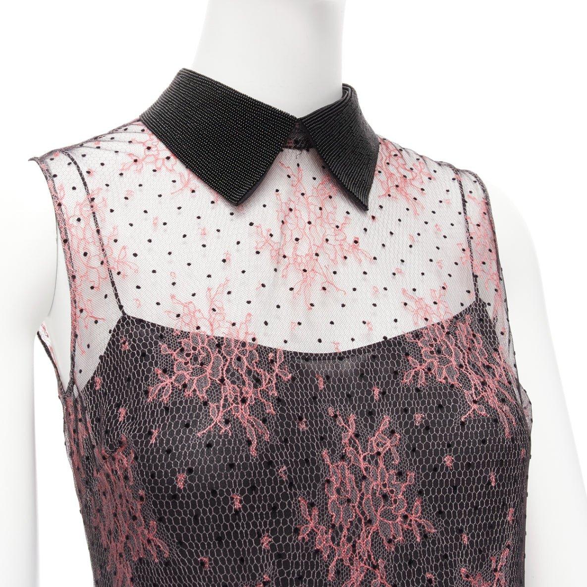 CHRISTIAN DIOR  black pink intricate lace overlay playsuit romper FR34 XS
Reference: AAWC/A00692
Brand: Dior
Designer: Maria Grazia Chiuri
Material: Modal, Blend
Color: Pink, Black
Pattern: Lace
Closure: Zip
Lining: Black Fabric
Extra Details: Back
