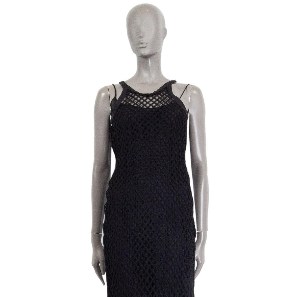 100% authentic Christian Dior two layers long net dress in black tulle and silk (missing content tag). Has been worn and is in excellent condition. 

Tag Size	XS
Bust	66cm (25.7in) to 80cm (31.2in)
Waist	70cm (27.3in) to 80cm (31.2in)
Hips	76cm