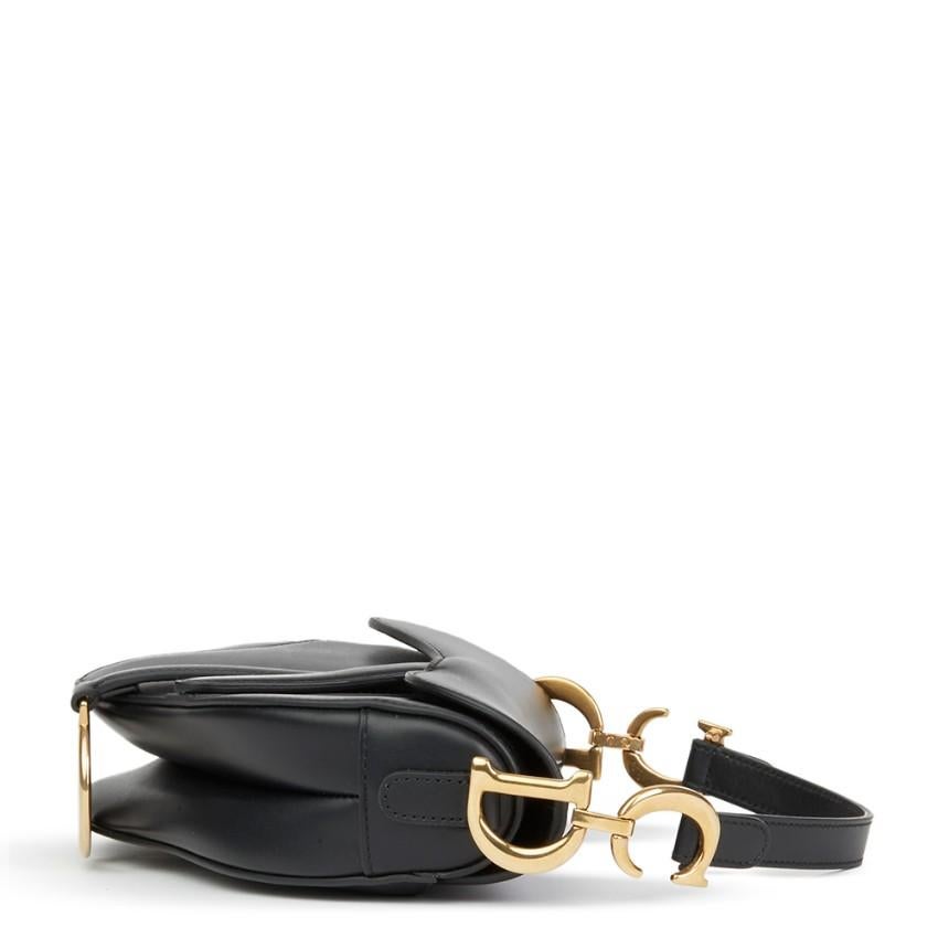 CHRISTIAN DIOR
Christian Dior Black Smooth Leather Mini Saddle Bag

Reference: 2182
Serial Number: 09-MA-0168
Age (Circa): 2018
Accompanied By: Dior Dust Bag, Box, Authenticity Card, Care Booklet, Protective Felt, Copy of Invoice
Authenticity