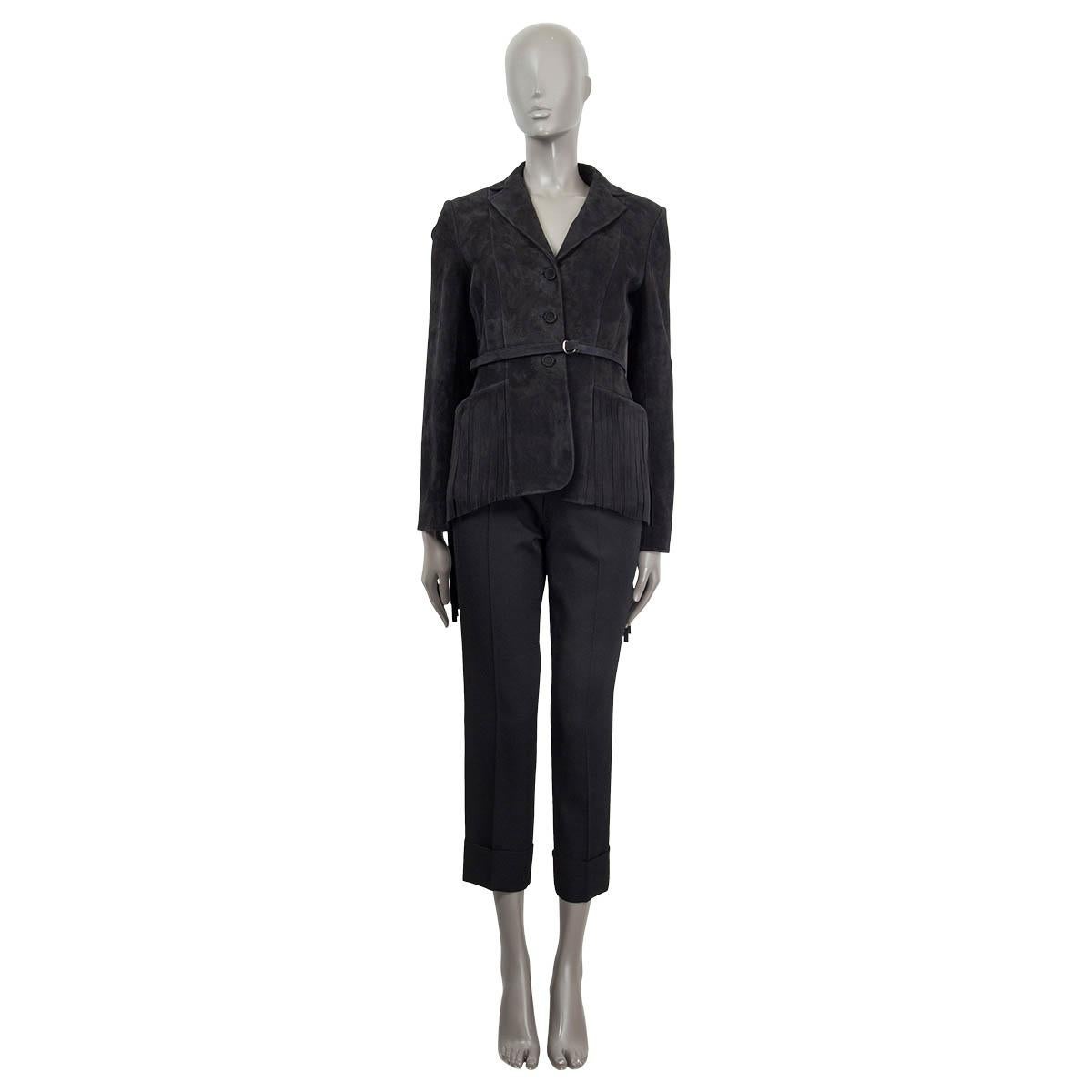 100% authentic Christian Dior 2018 resort collection suede jacket in black lamb leather (100%). Features two fringed slit pockets and sleeves. Opens with three black suede buttons in the front and comes with tag and matching belt. Brand new.