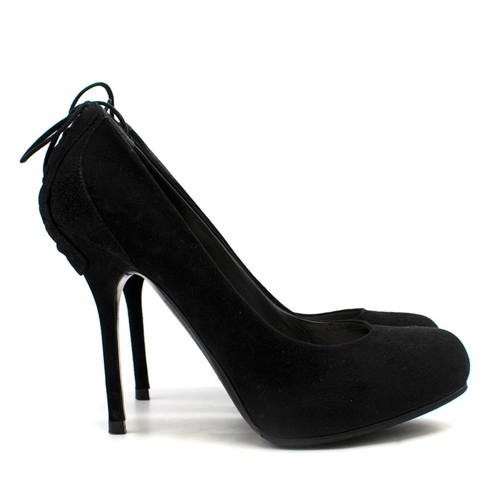 Christian Dior Black Suede Lace-Up Back Pumps

-Black suede high heel, with tie up bow detailing on heel of the shoe,
-leather insole, Christian Dior logo,
-Platform 
-leather interior 
-round toe shoe,
-Dust bag included

Please note, these items