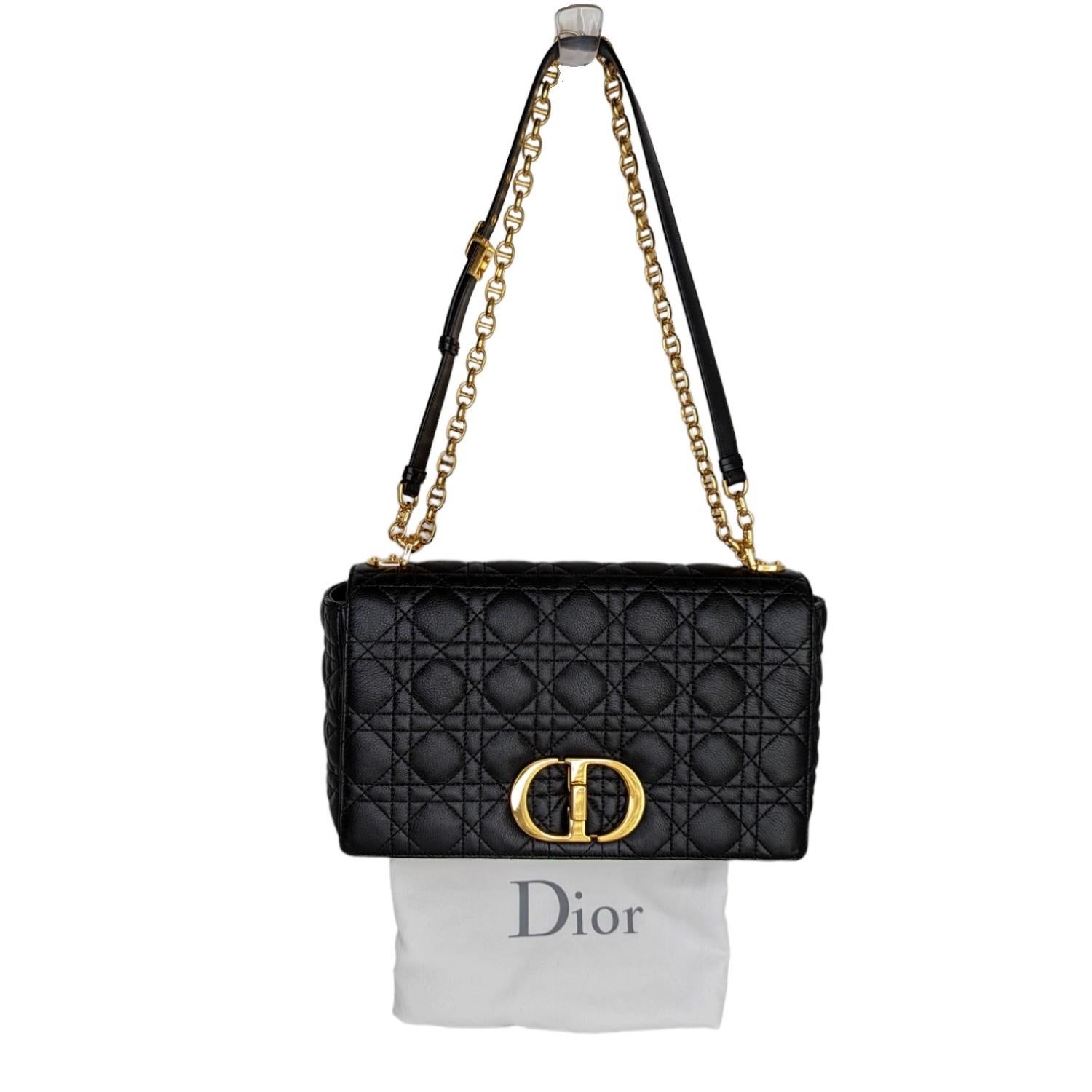 The Dior Caro bag combines modernity with timeless elegance. The design is crafted in black supple calfskin with Cannage stitching. The bag features a flap adorned with an antique gold-finish metal 'CD' twist clasp, inspired by the seal of a