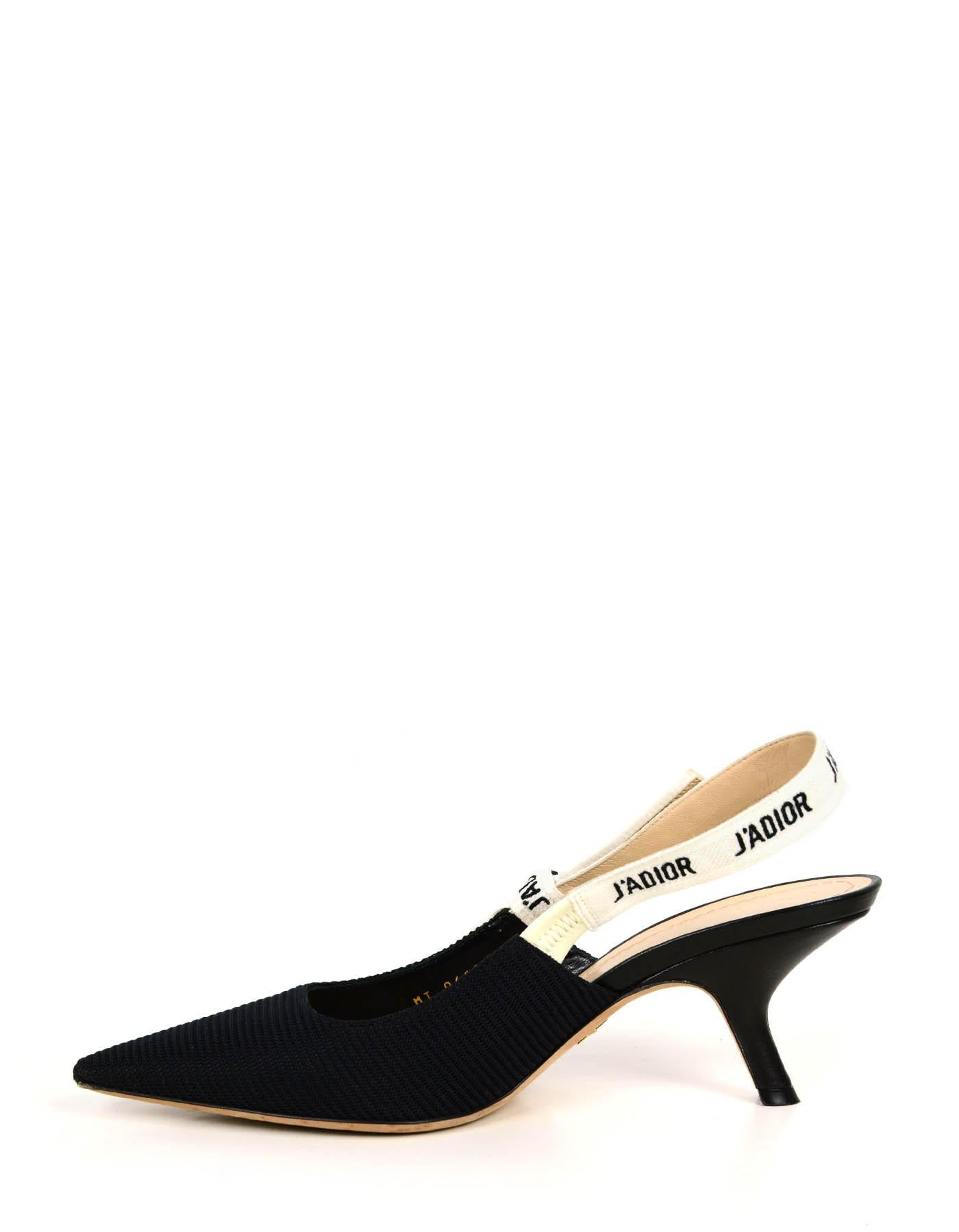Christian Dior Black Technical Canvas Ribbon J’ADIOR Slingback Pumps

Made In: Italy
Color: Black
Materials:Technical canvas & ribbon
Closure/Opening: Slingback
Overall Condition: Very good/excellent. Wear to bottom tips
Estimated