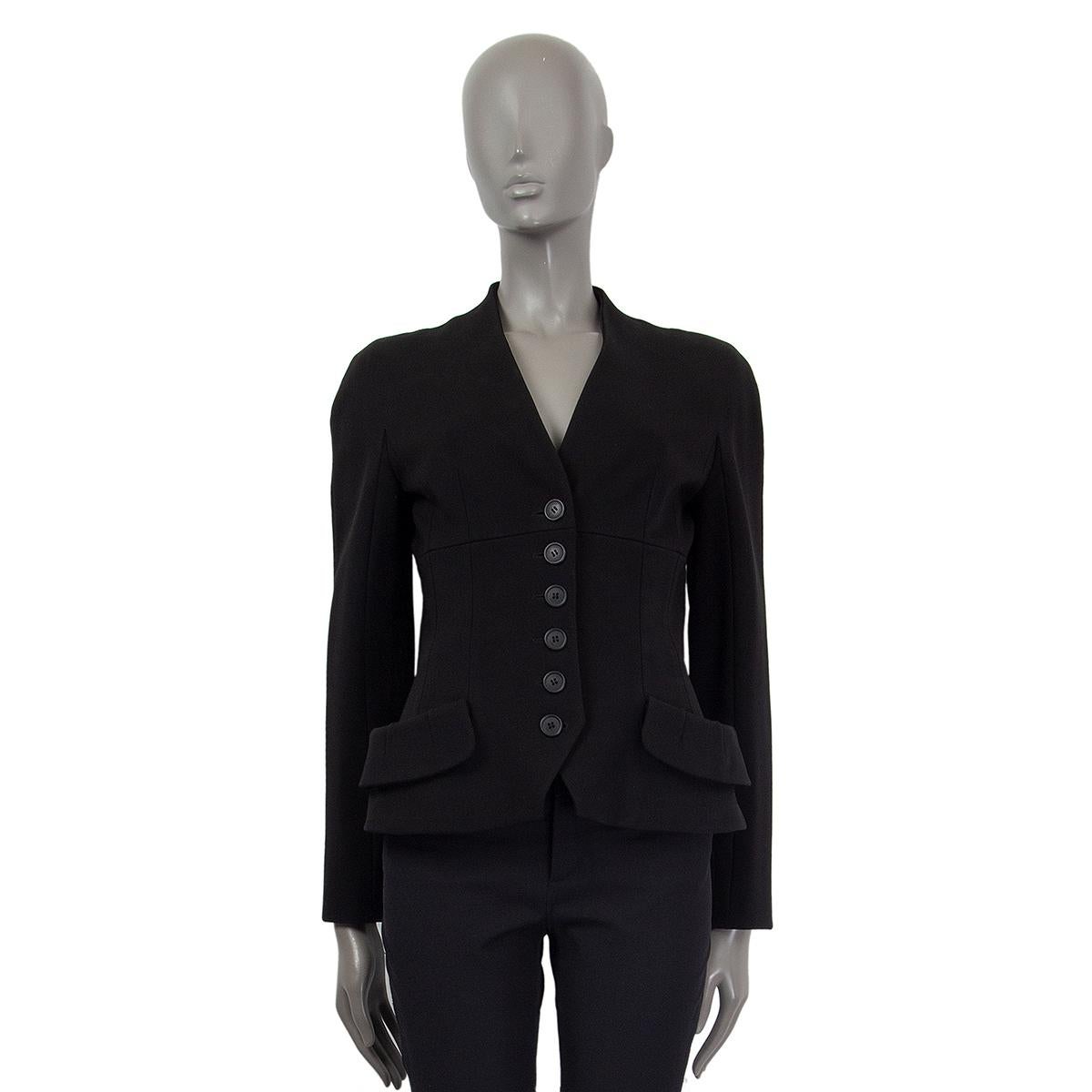 Christian Dior collarless blazer in black viscose (with 4%) elastane. Two front pockets. Lined in black silk (with 6% lycra). Has been worn with minor signs of use along the neckline. Overall in excellent condition.

Tag Size 38
Size S
Bust 88cm
