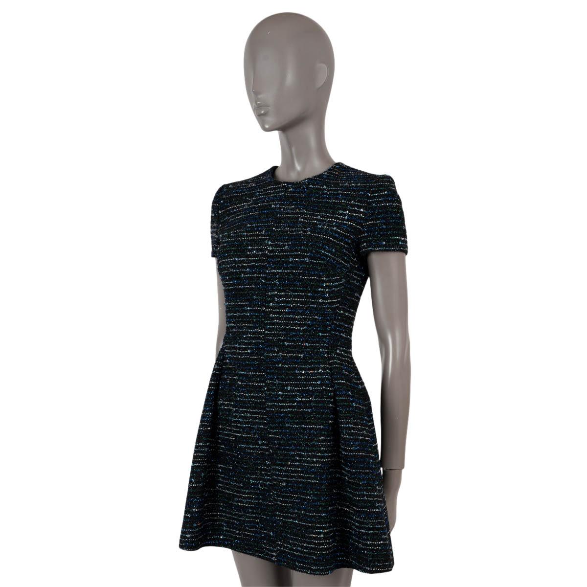 100% authentic Christian Dior tweed sheath dress in black wool (55%), nylon (34%), metalised yarn (4%), polyamide (3%), viscose (3%) and polyester (1%) Features a fit and flare silhouette, blue and green lurex details, short sleeves and two side