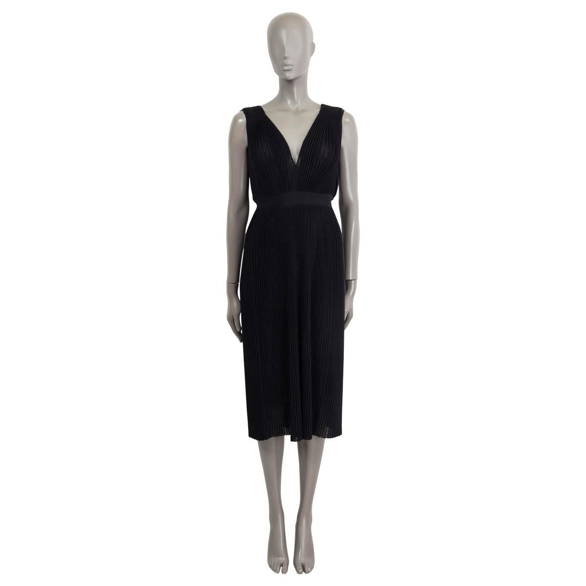 100% authentic Christian Dior sleeveless pleated midi dress in black wool and cashmere (assumed cause tag is missing). Opens with a zipper on the back. Unlined. Has been worn and is in excellent condition.

Measurements
Tag Size	Missing Tag