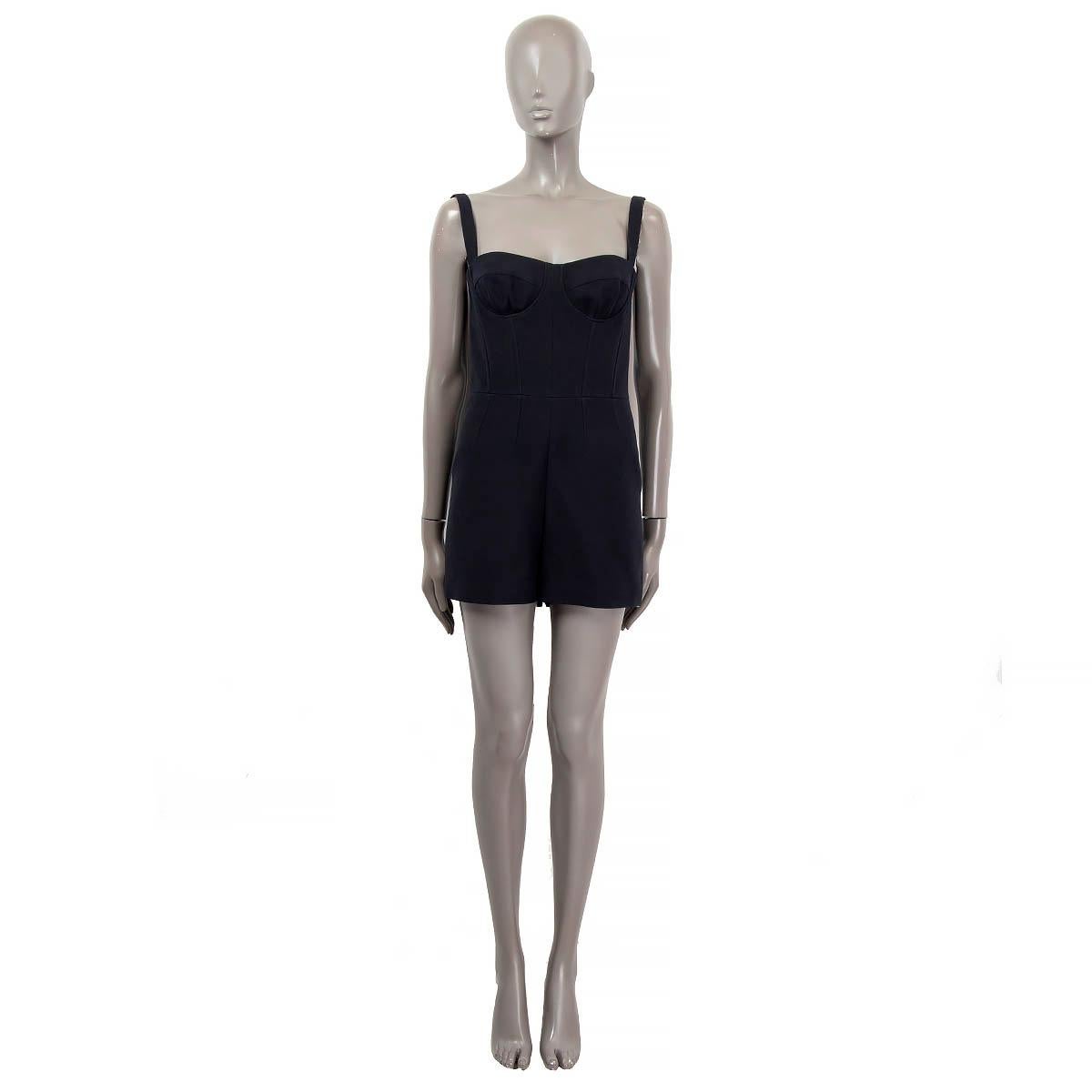 100% authentic Christian Dior mini bustier romper in black wool (77%) and silk (23%). Opens with a zipper on the back. Lined in black silk (100%). Has been worn and is in excellent.

2018 Spring/Summer

Measurements
Model	Dior18E
Tag
