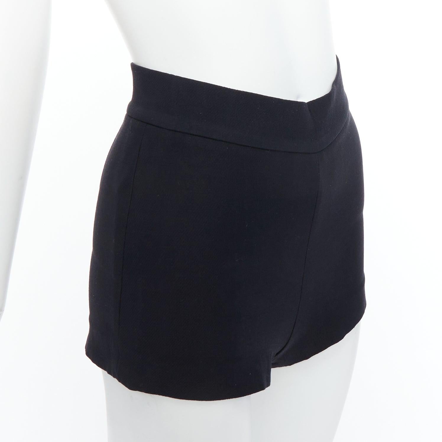 CHRISTIAN DIOR black wool silk crepe back darted high waisted shorts FR34 XS
Reference: YIKK/A00145
Brand: Dior
Designer: Maria Grazia Chiuri
Material: Wool, Silk
Color: Black
Pattern: Solid
Closure: Zip
Lining: Black Fabric
Extra Details: Side