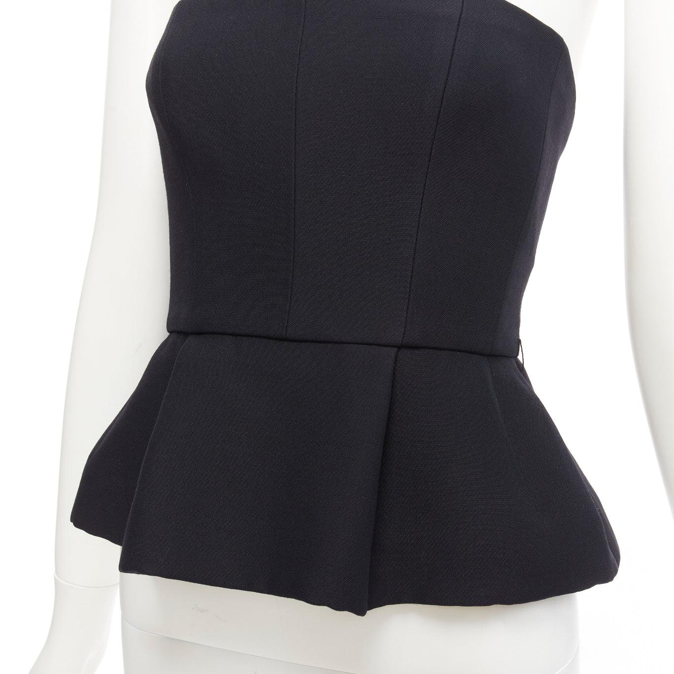 CHRISTIAN DIOR black wool silk minimal boned corset peplum bustier top FR34 XS
Reference: AAWC/A00737
Brand: Dior
Material: Wool, Silk
Color: Black
Pattern: Solid
Closure: Zip
Lining: Black Silk
Extra Details: Boned with silk lining. Back zip