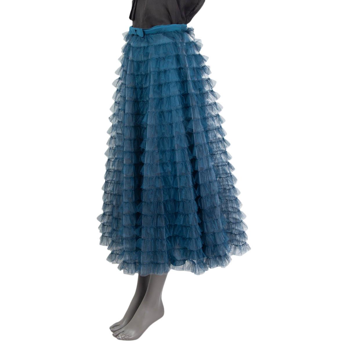 100% authentic Christian Dior 2021 frilled midi skirt in gradient blue tulle (100% polyester - please note the content tag is missing). Bow at the waist on the front. Opns with five push buttons and two hooks at the side. Comes with a silk (assumed