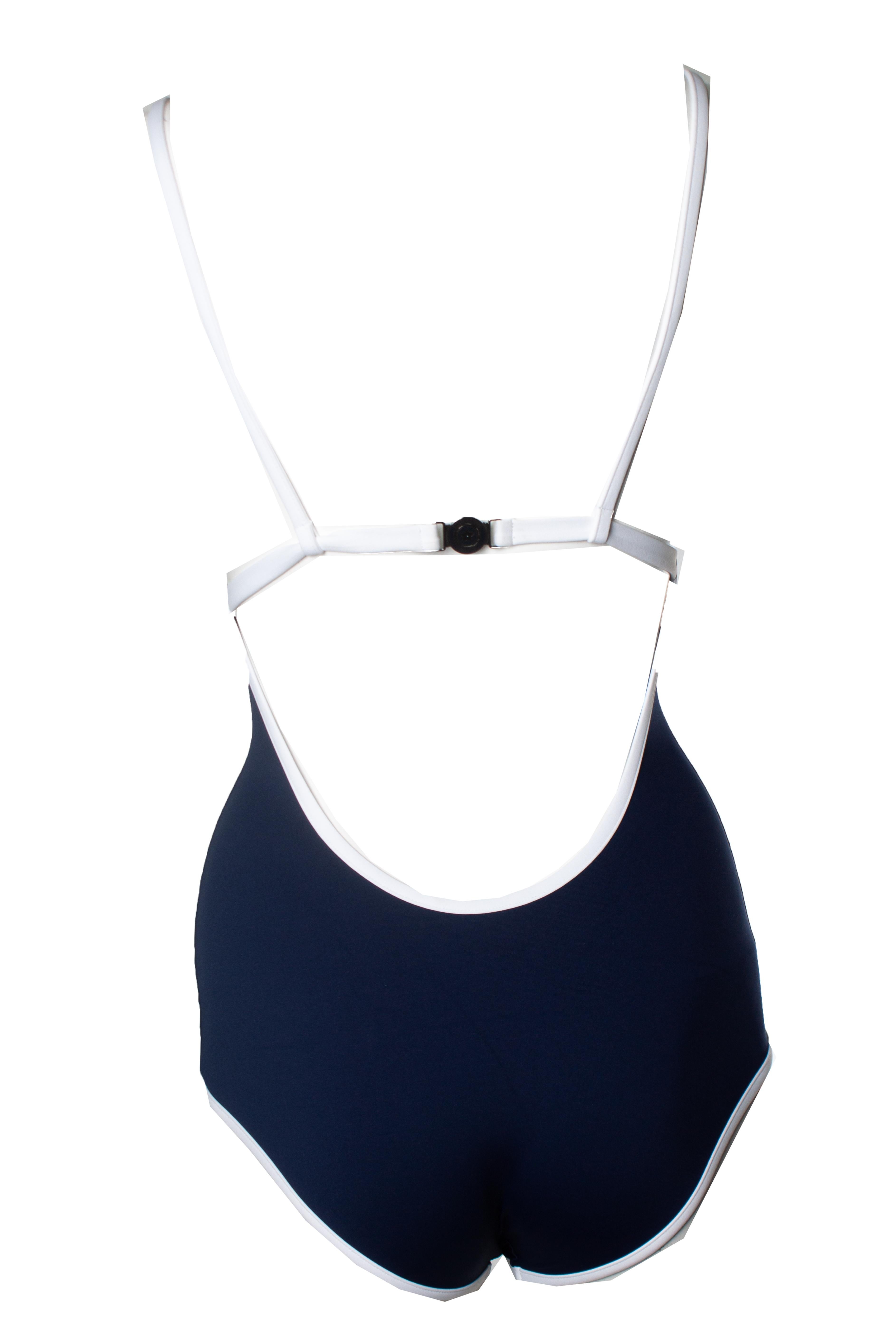 Christian Dior, Blue bathing suit. The item is new - unworn. Comes with dustbag and copy of receipt.

* CONDITION: new 

* SIZE: S 

* MEASUREMENTS: length 72 cm, width 30 cm (stretch)

* MATERIAL: 74% polyester 26% elastan 

* CARE: hand wash 

*