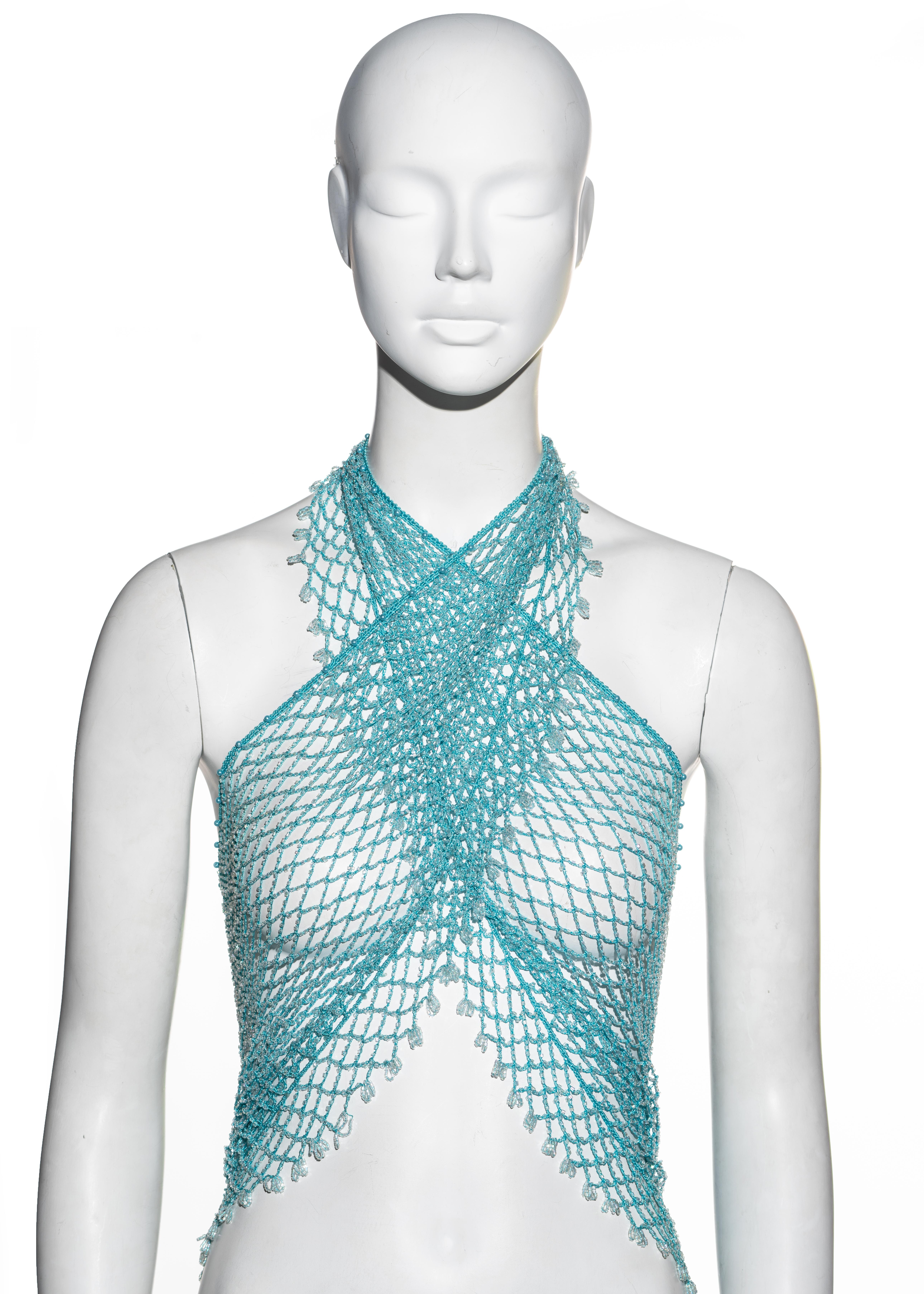 ▪ Diorling by Christian Dior blue beaded crochet scarf
▪ The scarf is multifunctional and can be worn as a halter top, bandeau top, sarong, mini skirt and headscarf
▪ Heavily beaded with clear beads 
▪ Loop tassel trim 
▪ The Diorling line was