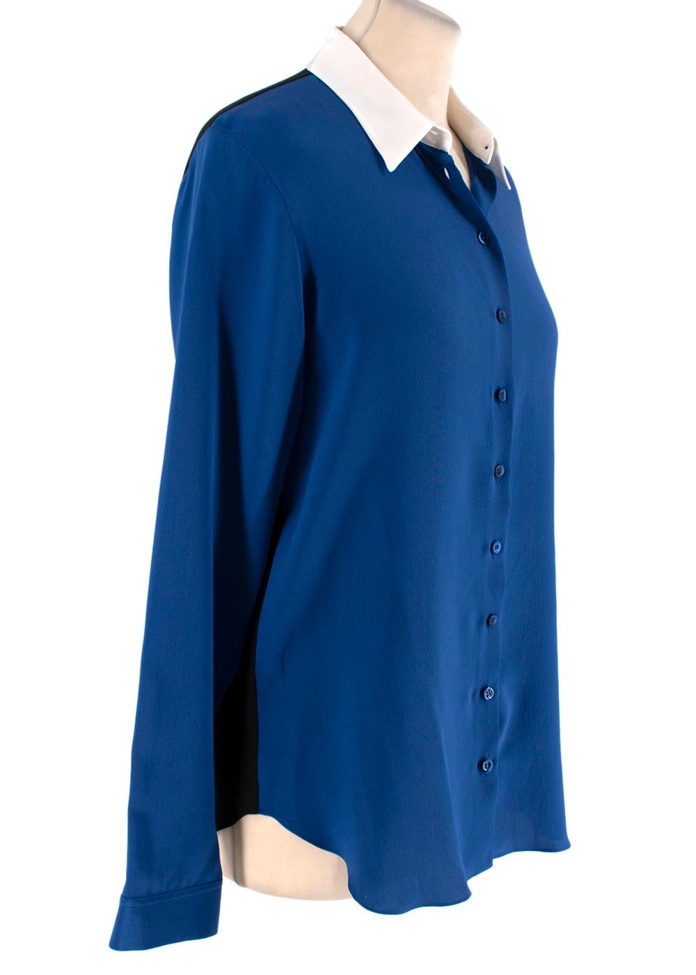 Christian Dior Blue & Black Silk Crepe Blouse

- Tricolour blue, black, and ivory silk-crepe blouse
- Button placket
- Contrast classic collar
- Classic fit

Materials:
100% Silk

Made in Italy
Dry clean only

PLEASE NOTE, THESE ITEMS ARE PRE-OWNED