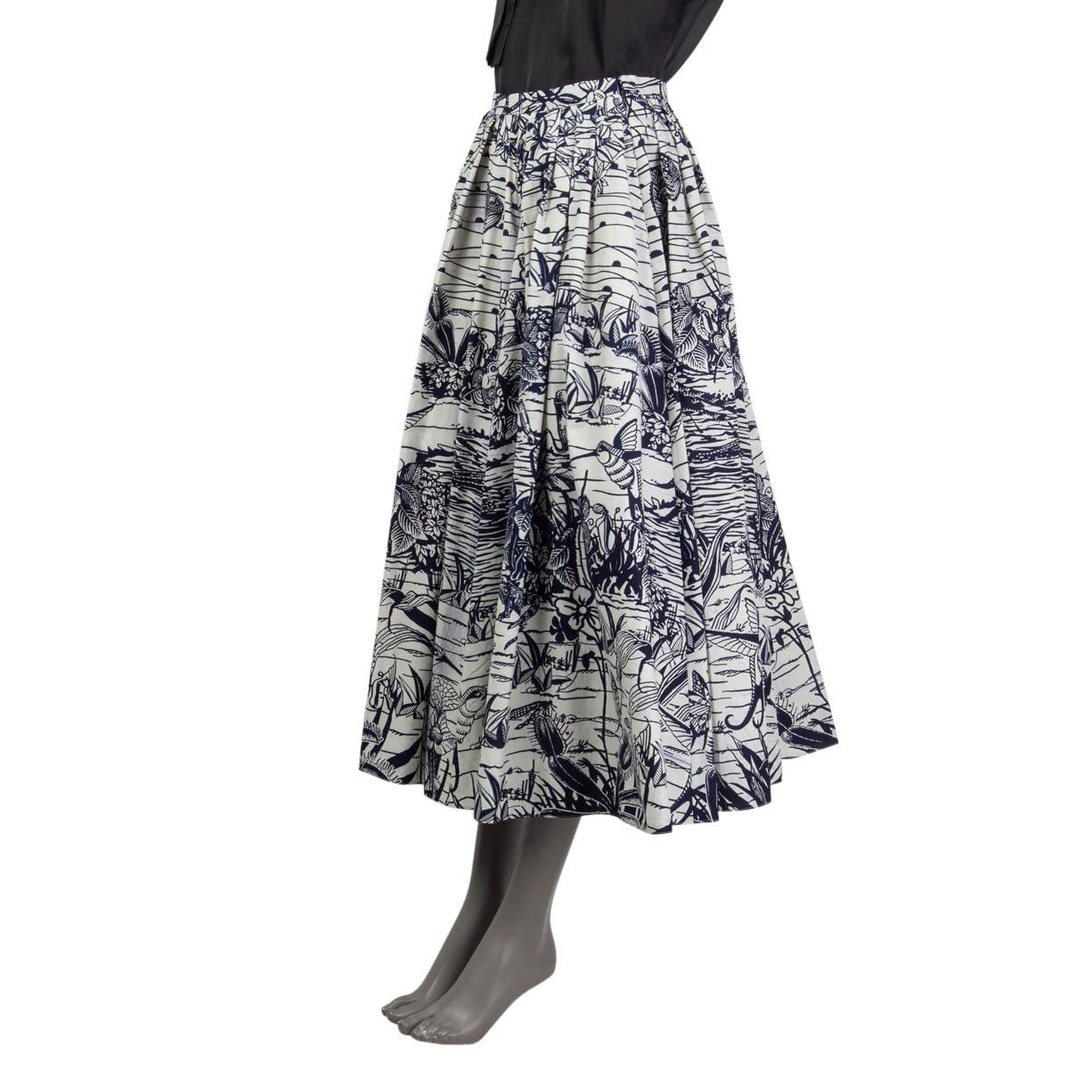 100% authentic Christian Dior Cruise 2020 animal print a-line skirt in blue, light gray and off-white cotton (100%). Opens with a concealed zipper and a hook at the side. Unlined. Has been worn and is in excellent condition. Matching signature T-bar
