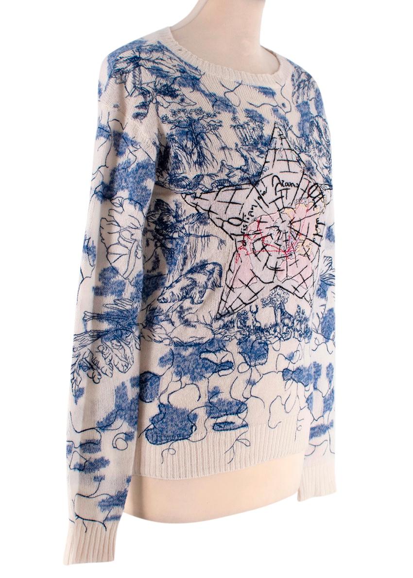 Christian Dior Blue & Cream Around The World Cashmere Sweater
 

 - Lightweight, airy knit with slightly open weave
 - Hand embroidered across the body featuring swirls, a star motif and the Maison's signature 
 - Background pattern reminiscent of