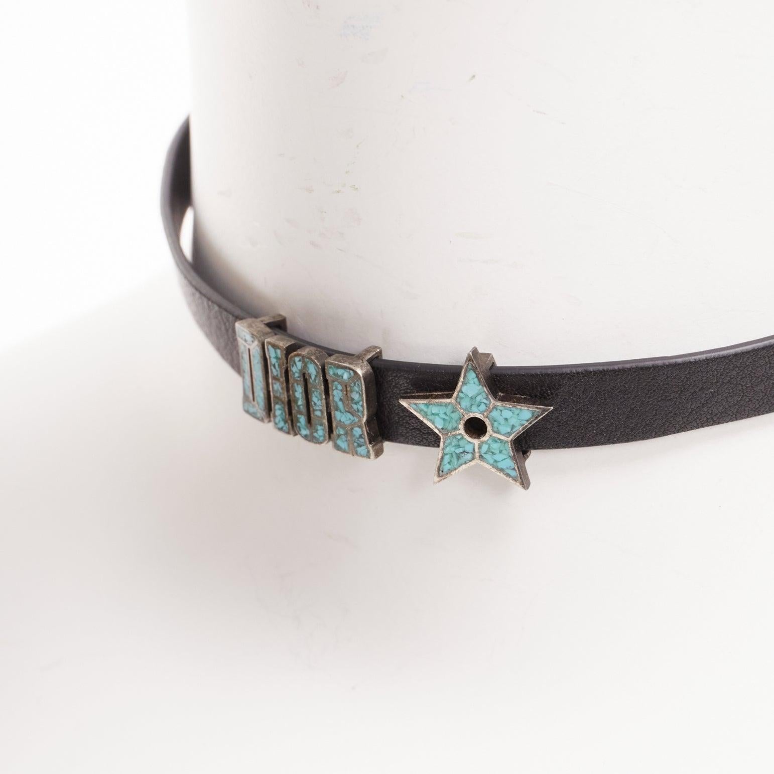 CHRISTIAN DIOR blue marble logo star charm black leather short choker
Reference: AAWC/A01036
Brand: Dior
Designer: Maria Grazia Chiuri
Material: Metal, Leather
Color: Black, Blue
Pattern: Solid
Closure: Belt
Lining: Black