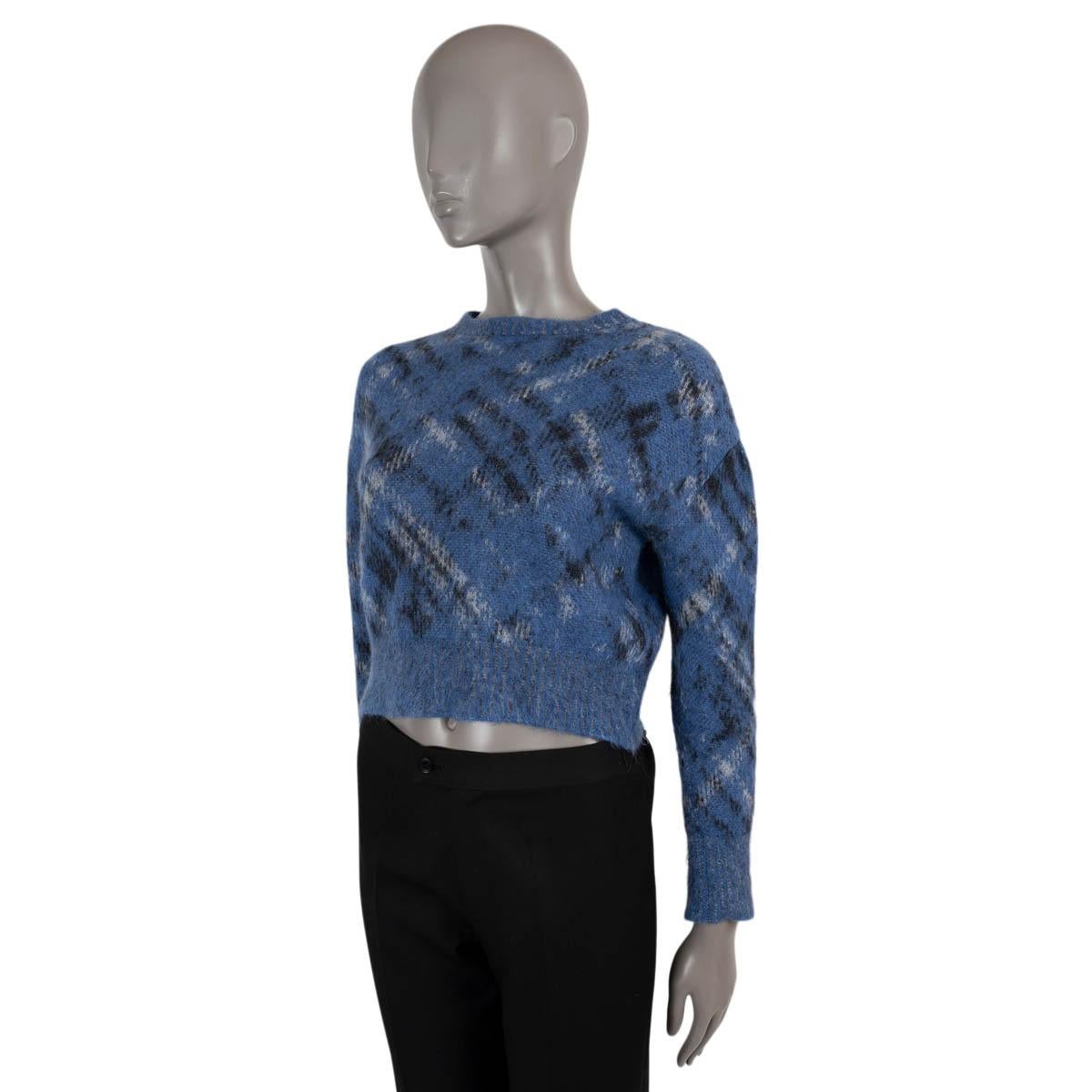 100% authentic Christian Dior Check'n'Dior sweater in blue, black and white mohair  (37%), alpaca (35%) and polyamide (30%). Features a cropped silhouette, round neck and rib-knit hems. Has been worn and is in excellent condition.

2023