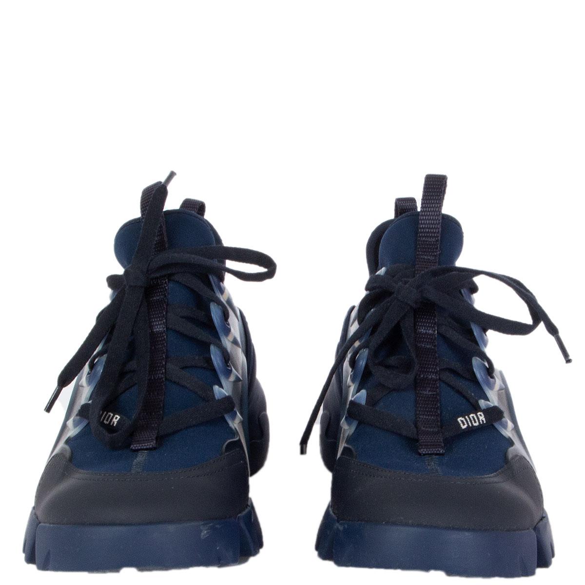 100% authentic Christian Dior D-Connect sneakers in indigo blue neoprene, it features transparent rubber yokes and a wrap-around rubber sole. The grosgrain ribbon stitched on the upper compliments the tone-on-tone laces with the' D.I.O.R'.