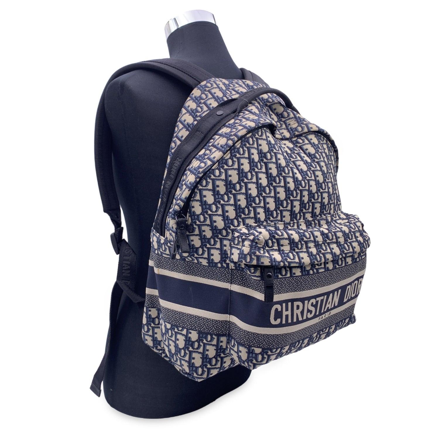 This beautiful Bag will come with a Certificate of Authenticity provided by Entrupy. The certificate will be provided at no further cost Beautiful DiorTravel backpack crafted in blue waterproof Dior Oblique technical jacquard. 'CHRISTIAN DIOR PARIS'