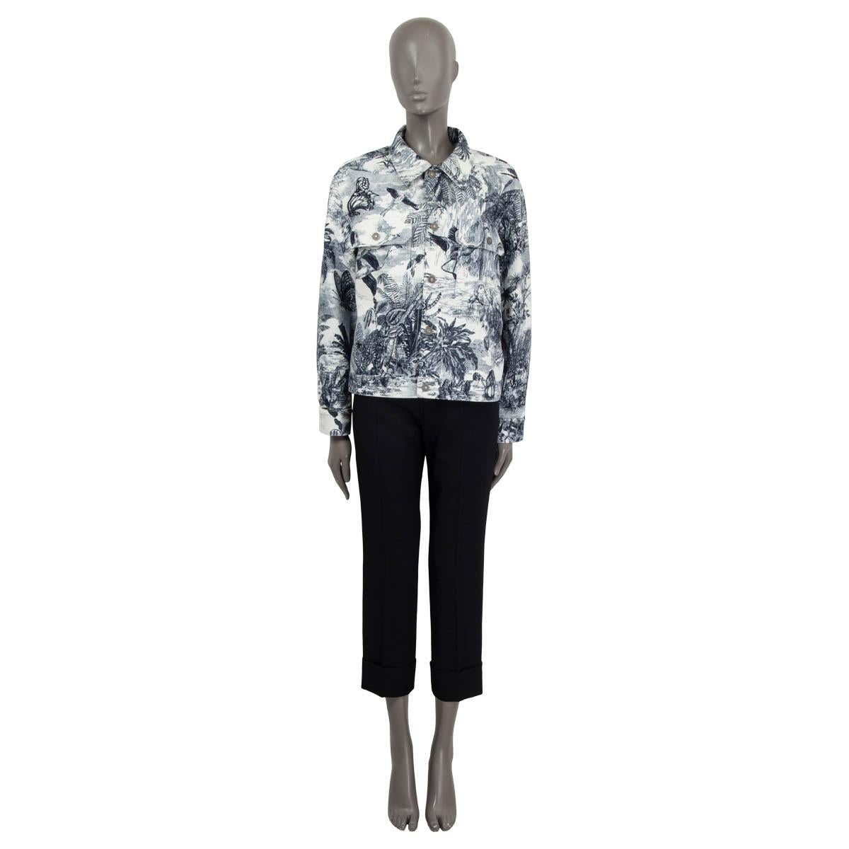 100% authentic Christian Dior 2020 Toile Du Jouy Tropicalia oversized denim jacket in off-white and navy cotton (100%). Features buttoned cuffs and two buttoned patch pockets on the front. Opens with buttons on the front. Unlined. Has been worn once