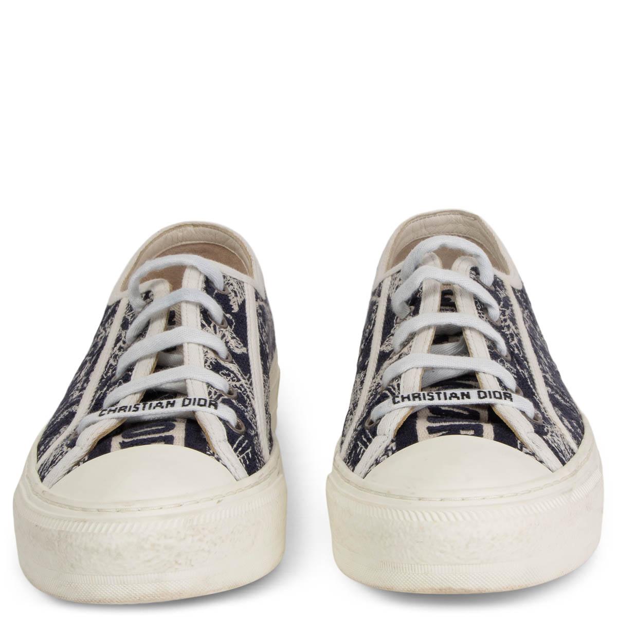 100% authentic Christian Dior Walk'n'Dior sneakers in deep navy blue and off-white Toile de Jouy motif, inspired by the House archives. Crafted in embroidered cotton completed by signatures on the tongue. Rubber sole with star, Christian Dior's