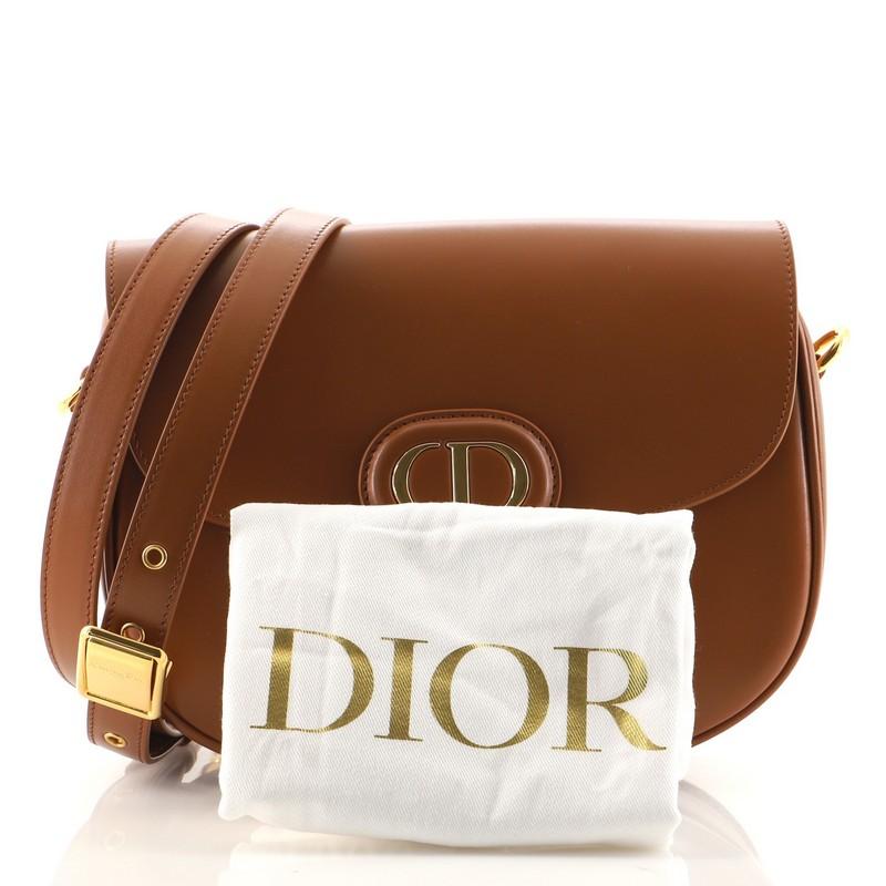 Condition: Excellent. Light indentations on rear near base, scratches on hardware.
Accessories: Dust Bag, With Strap
Measurements: Height 6.5