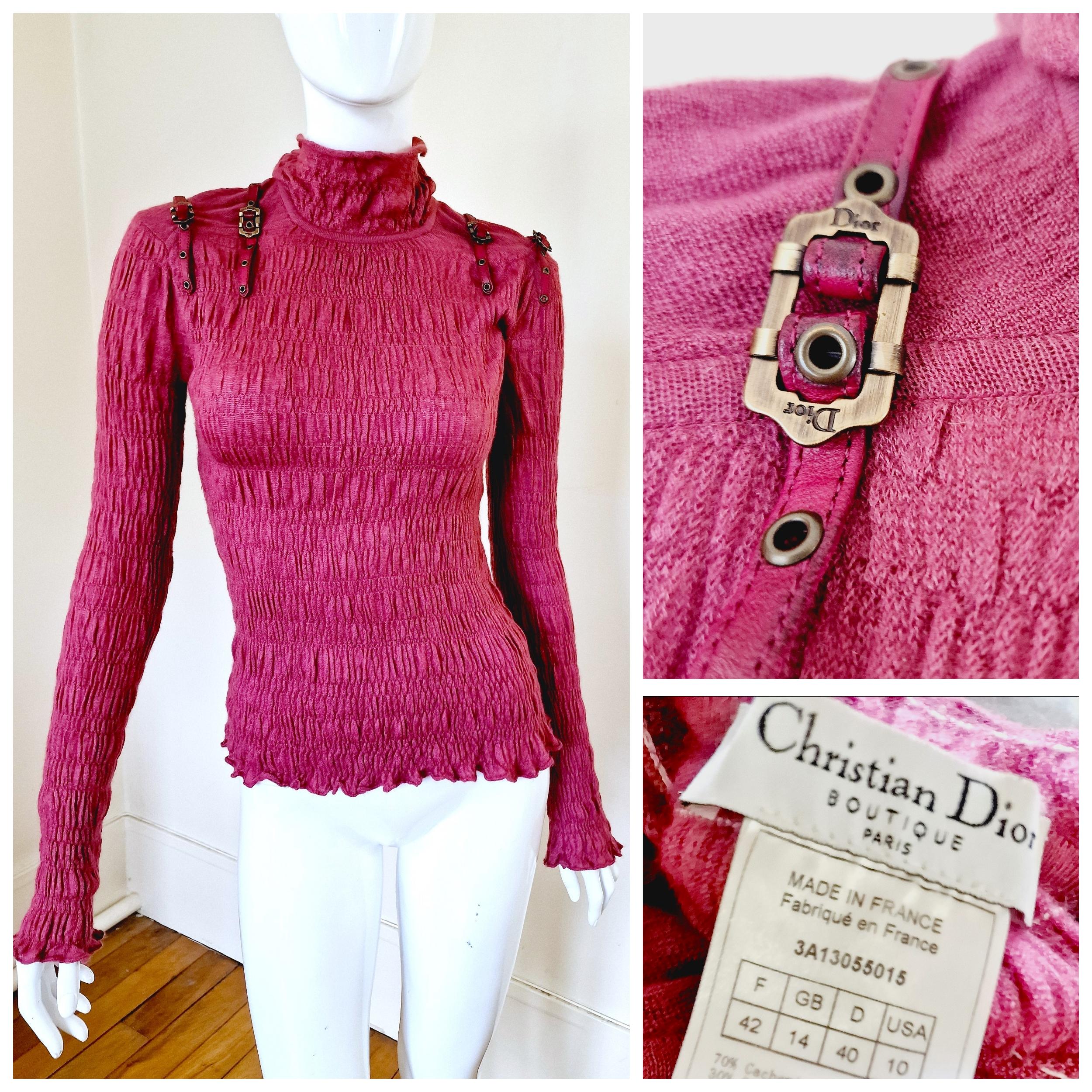 Bondage straps top by Dior!
70% cachmire, 30&% silk! 
Super soft tounch! 
2-2 Dior signed metal straps on the shoulders! 

VERY GOOD condition!

SIZE
Women: Fits from M to L.
Marked size: FR42 / GB14 / D40 / USA10.
Stretchy fabric.
Length (front):