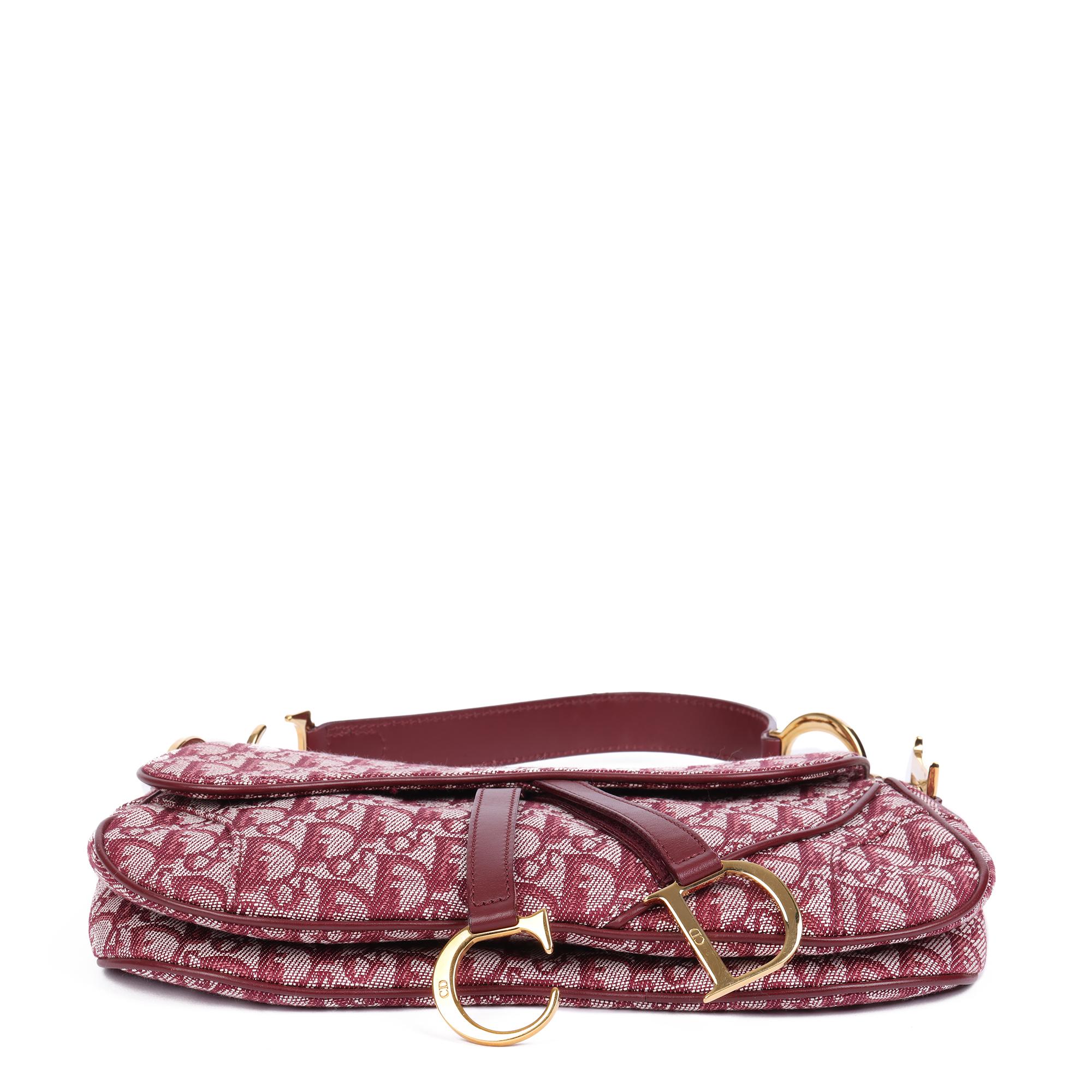 CHRISTIAN DIOR
Bordeaux Monogram Canvas & Calfskin Leather Double Saddle Bag

Xupes Reference: HB4129
Serial Number: RU0012
Age (Circa): 2002
Accompanied By: Authenticity Card, Care Booklet
Authenticity Details: Date Stamp (Italy)
Gender: