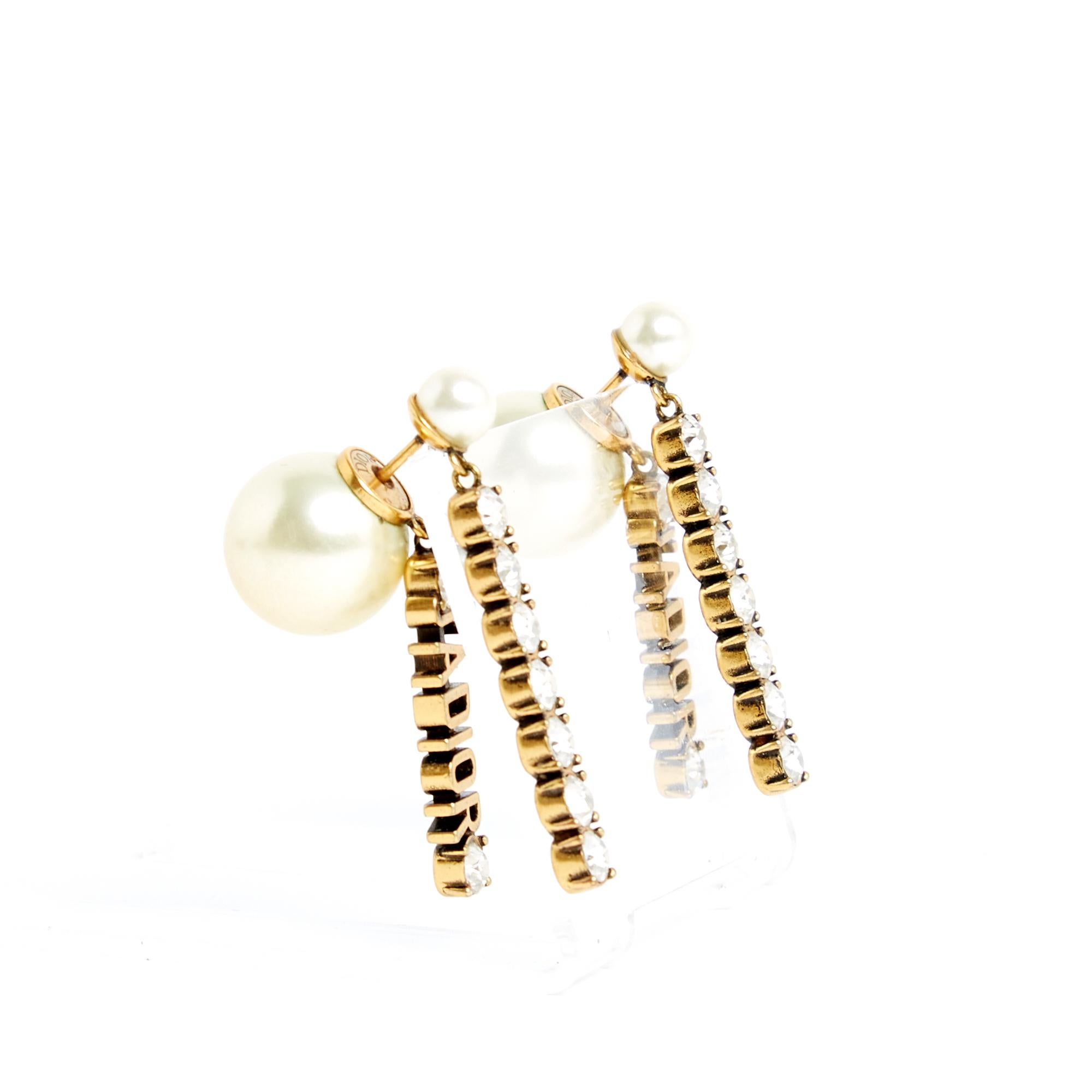 Dior Tribales J'Adior earrings composed of a stud decorated with a small fancy pearl and a pendant encrusted with iridescent white rhinestones and a large fancy pearl with a J'Adior pendant surrounded by 2 coordinated rhinestones. Total height of