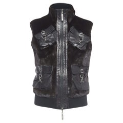 Christian Dior Boutique Schwarze ärmellose Jacke mit Reißverschluss aus Pelz und Leder M