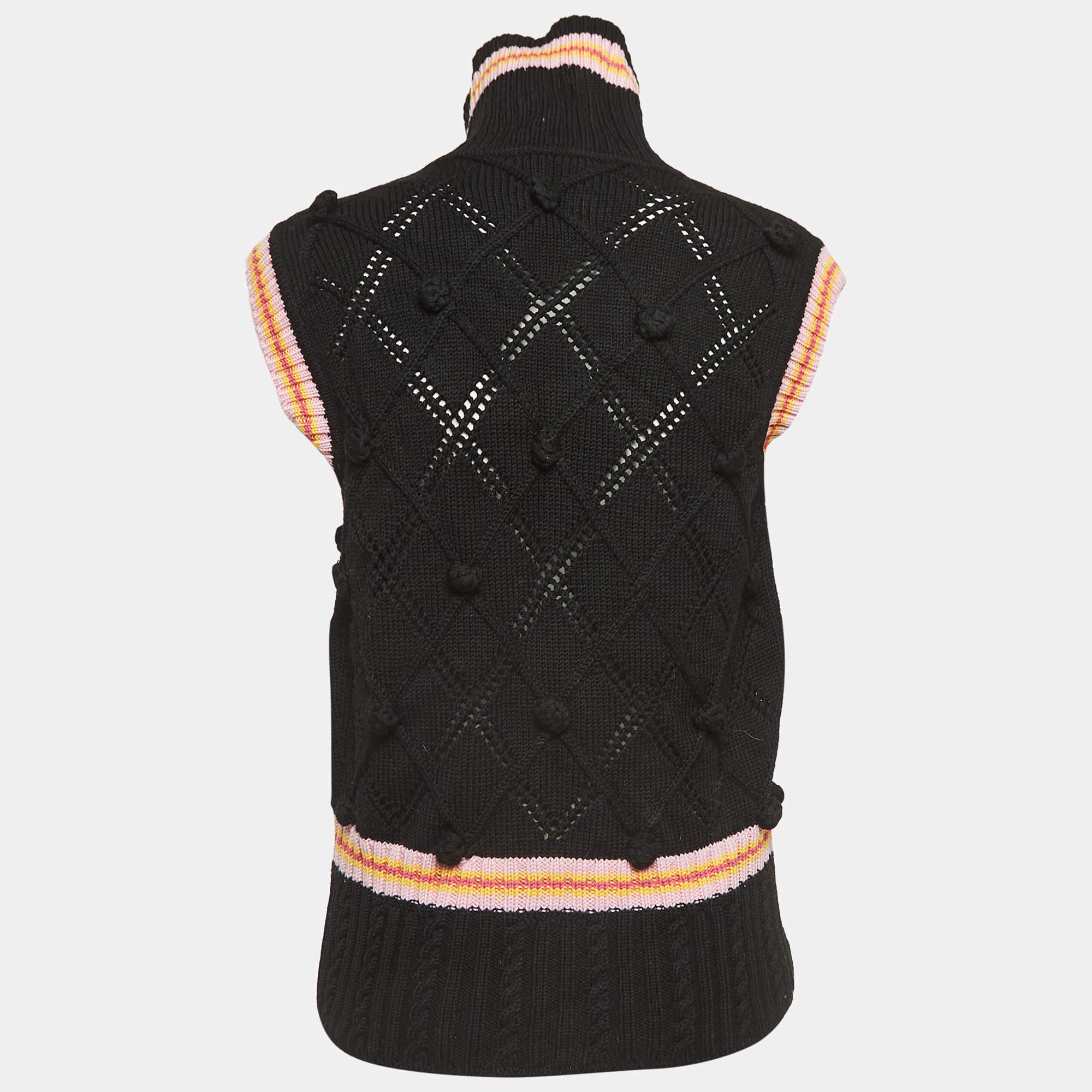 This vest by Christian Dior Boutique is aimed to provide comfortable luxury through clothing. Made to last, the knitted vest for women features a front zip closure.

