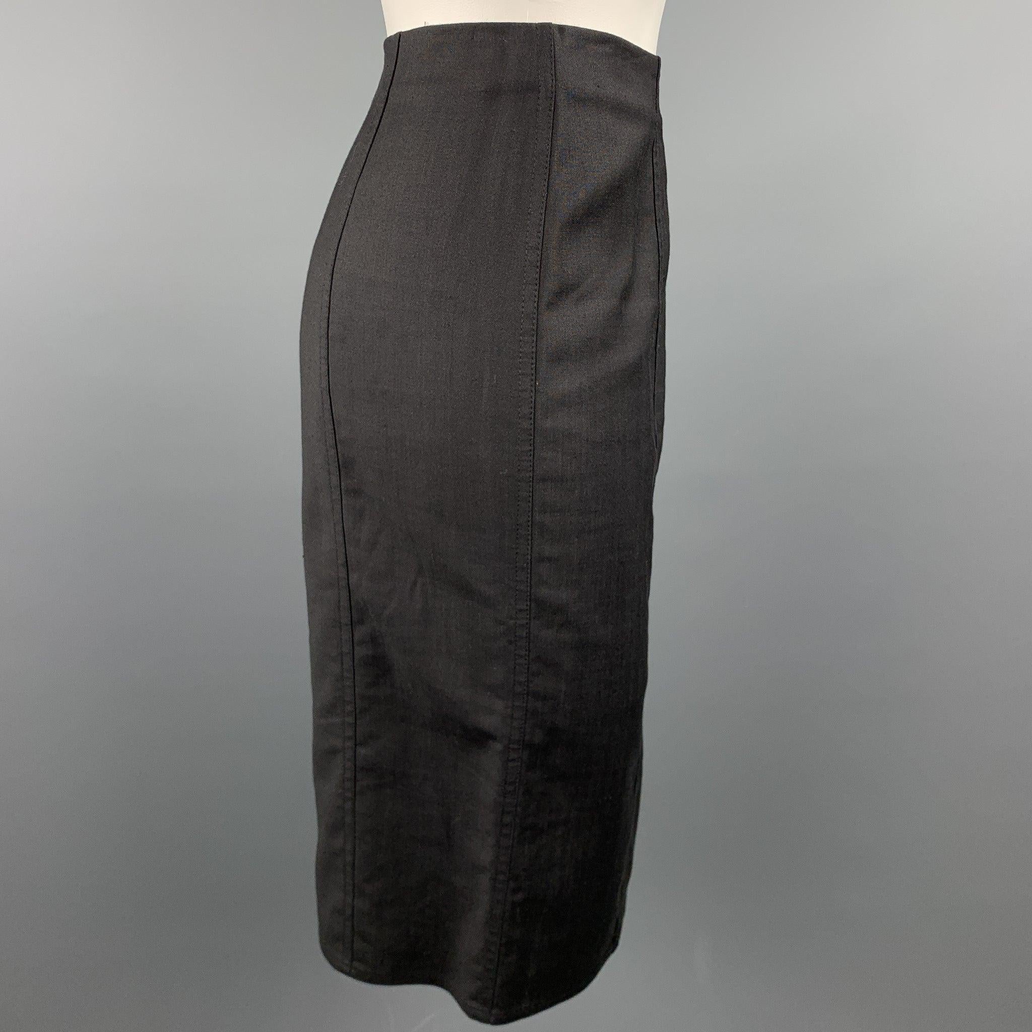 Vintage 2002/2003 CHRISTIAN DIOR BOUTIQUE by John Galliano skirt comes in a black viscose blend featuring a pencil style, front vent, and a side zipper closure. Made in France.Very Good
Pre-Owned Condition. 

Marked:   F 38 / GB 10 / D 36 / USA
